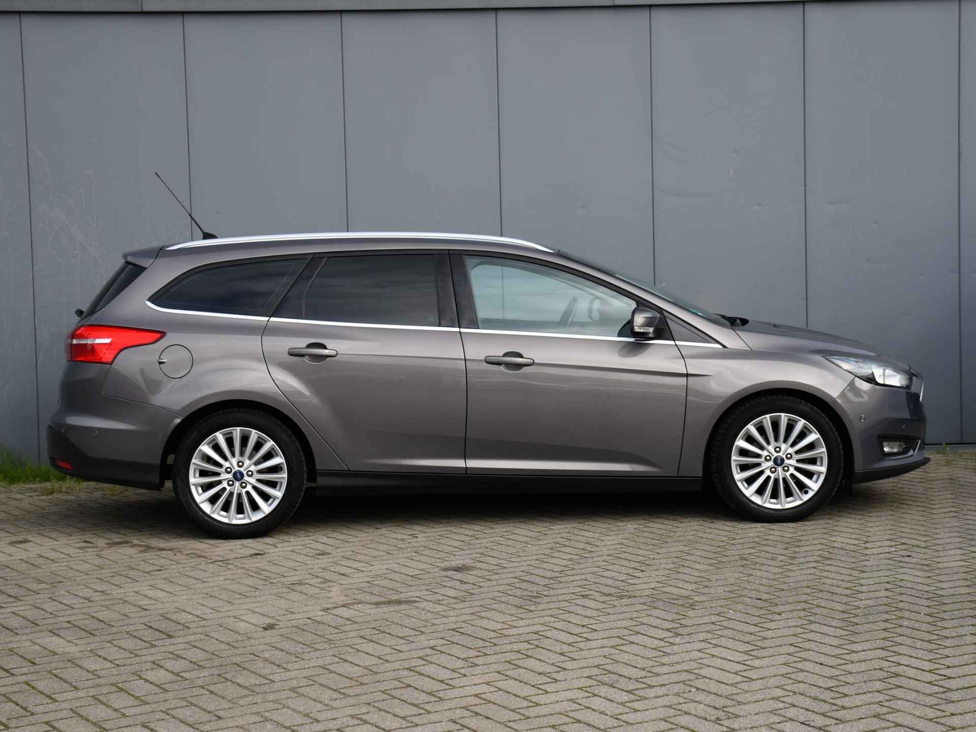 Ford Focus Wagon Titanium 1.0 125pk PDC | AUTOM. INPARKEREN | 17''LM  | CRUISE.C | NAVI | QUICK CLEAR - 3/31