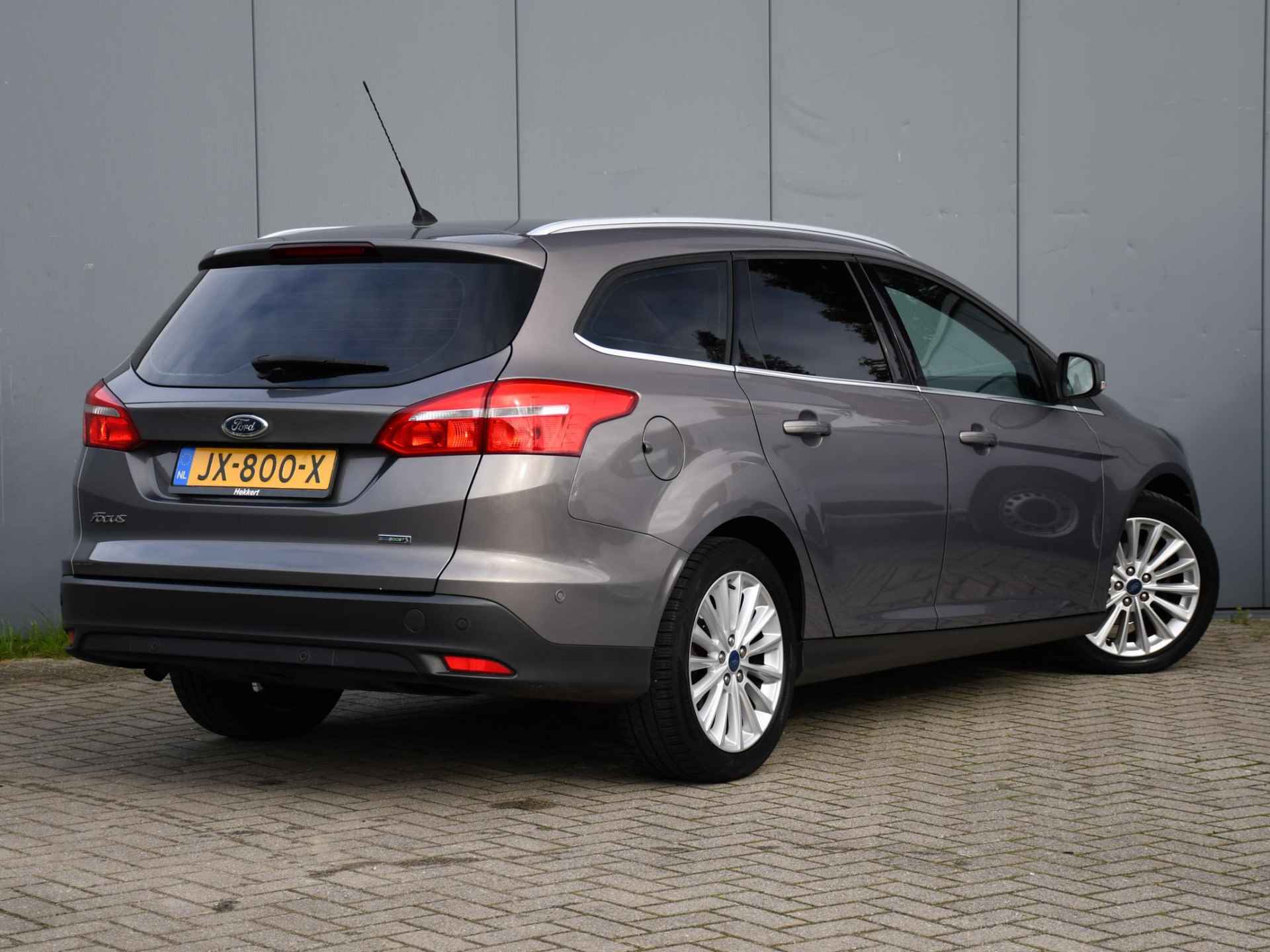 Ford Focus Wagon Titanium 1.0 125pk PDC | AUTOM. INPARKEREN | 17''LM  | CRUISE.C | NAVI | QUICK CLEAR - 4/31