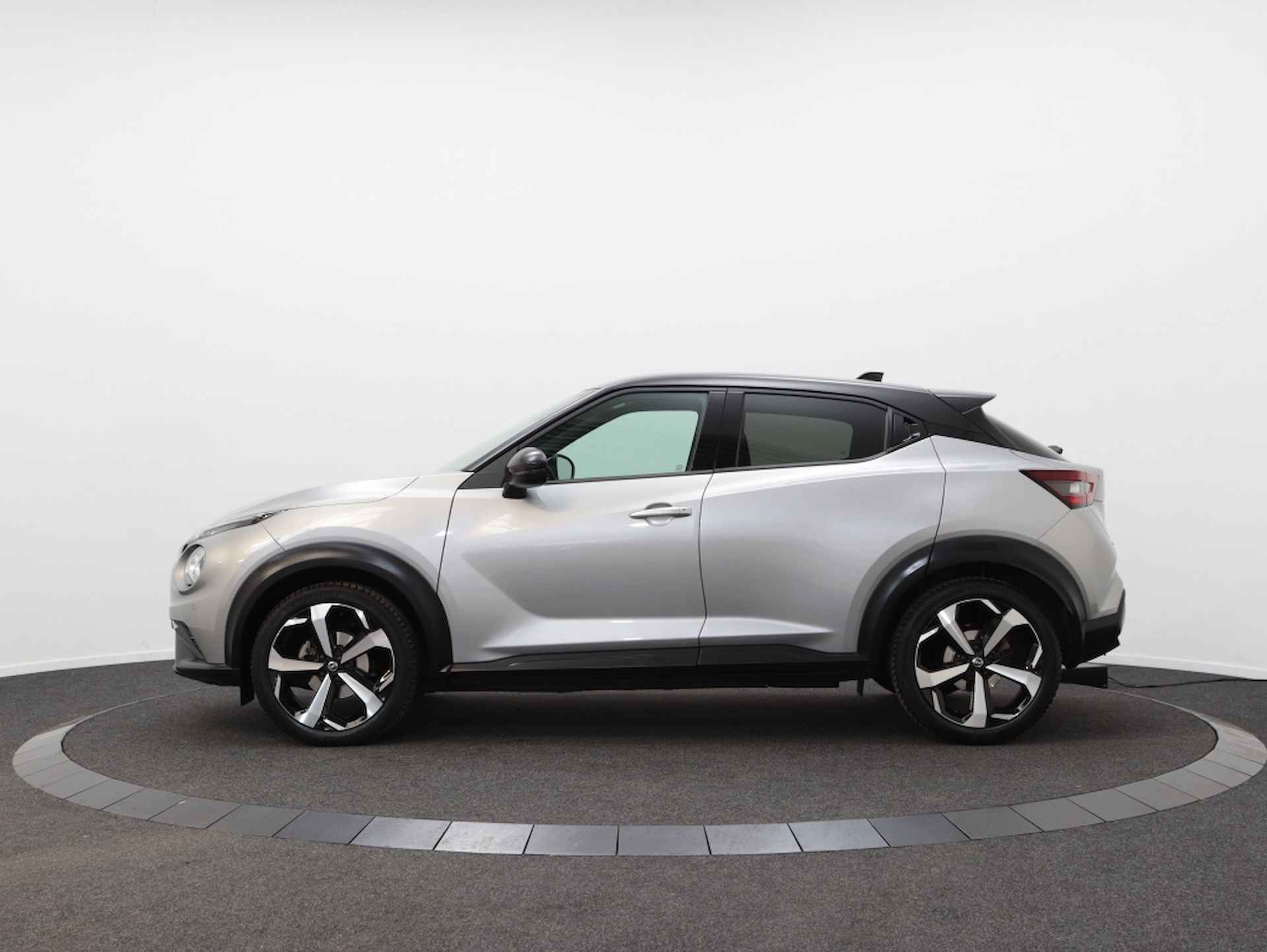 Nissan Juke 1.0 DIG-T Premire Edition | Navigatie | Stoel Verwarming | Airco - 11/44