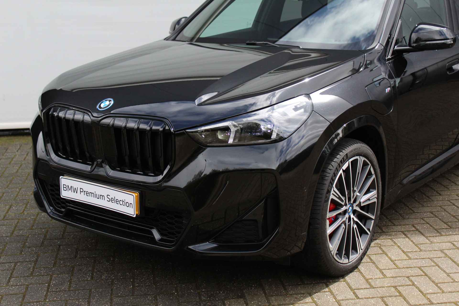 BMW X1 xDrive30e High Executive M Sport Automaat / Panoramadak / Trekhaak / Parking Assistant Plus / Adaptieve LED / Sportstoelen / Adaptief M Onderstel - 7/28