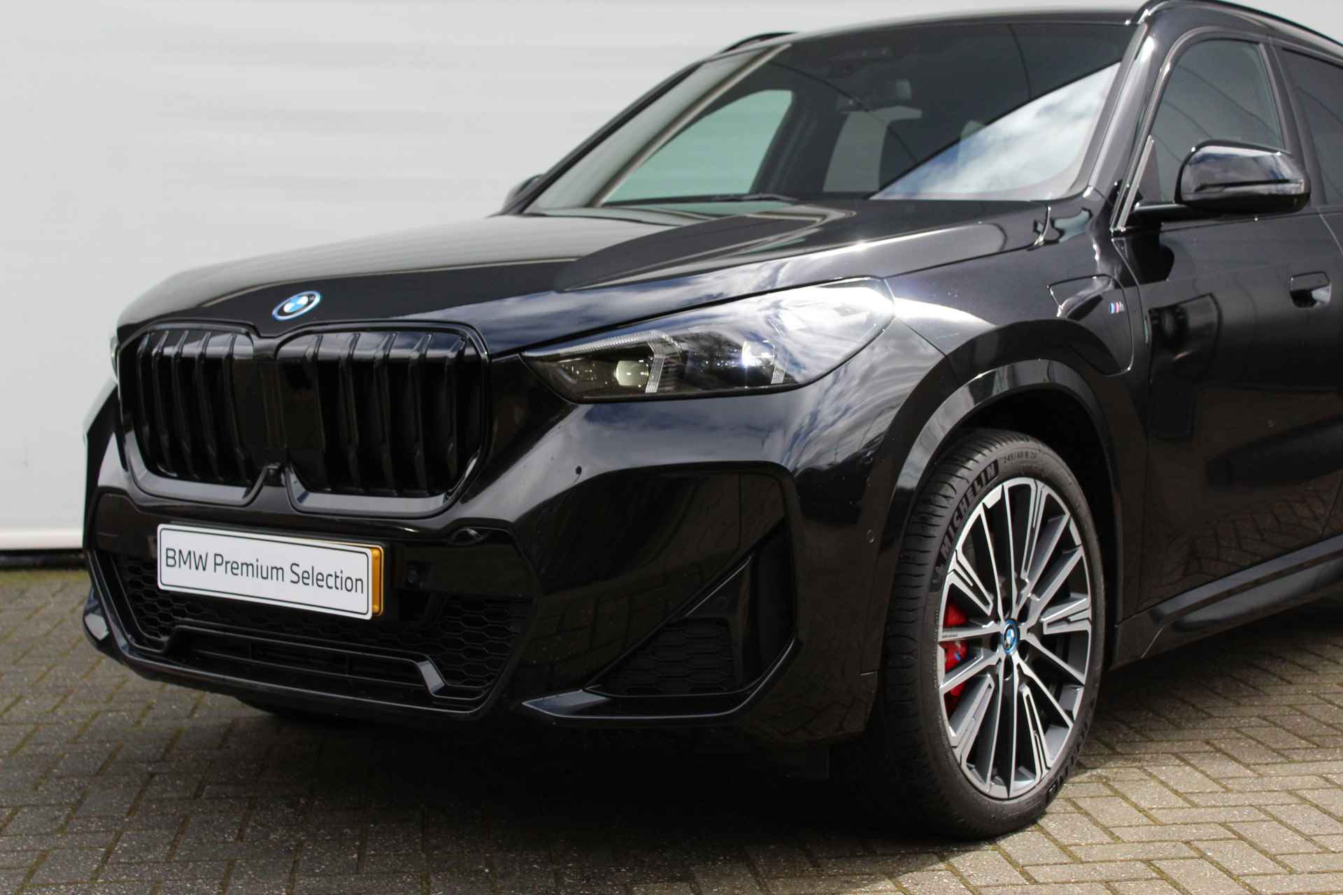 BMW X1 xDrive30e High Executive M Sport Automaat / Panoramadak / Trekhaak / Parking Assistant Plus / Adaptieve LED / Sportstoelen / Adaptief M Onderstel - 10/28
