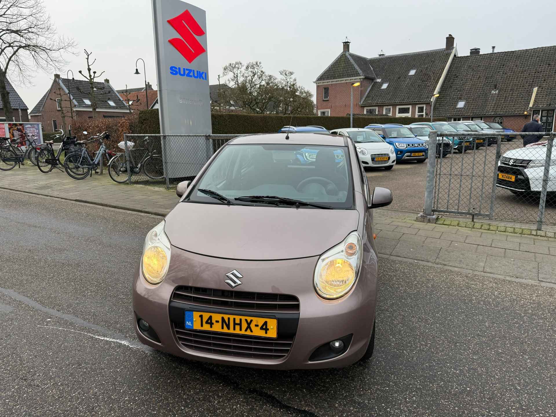 Suzuki Alto 1.0 Exclusive // Airco // Nette door ons onderhouden ALTO // Stootlijst // Spoiler // Rijklaarprijs! - 7/27