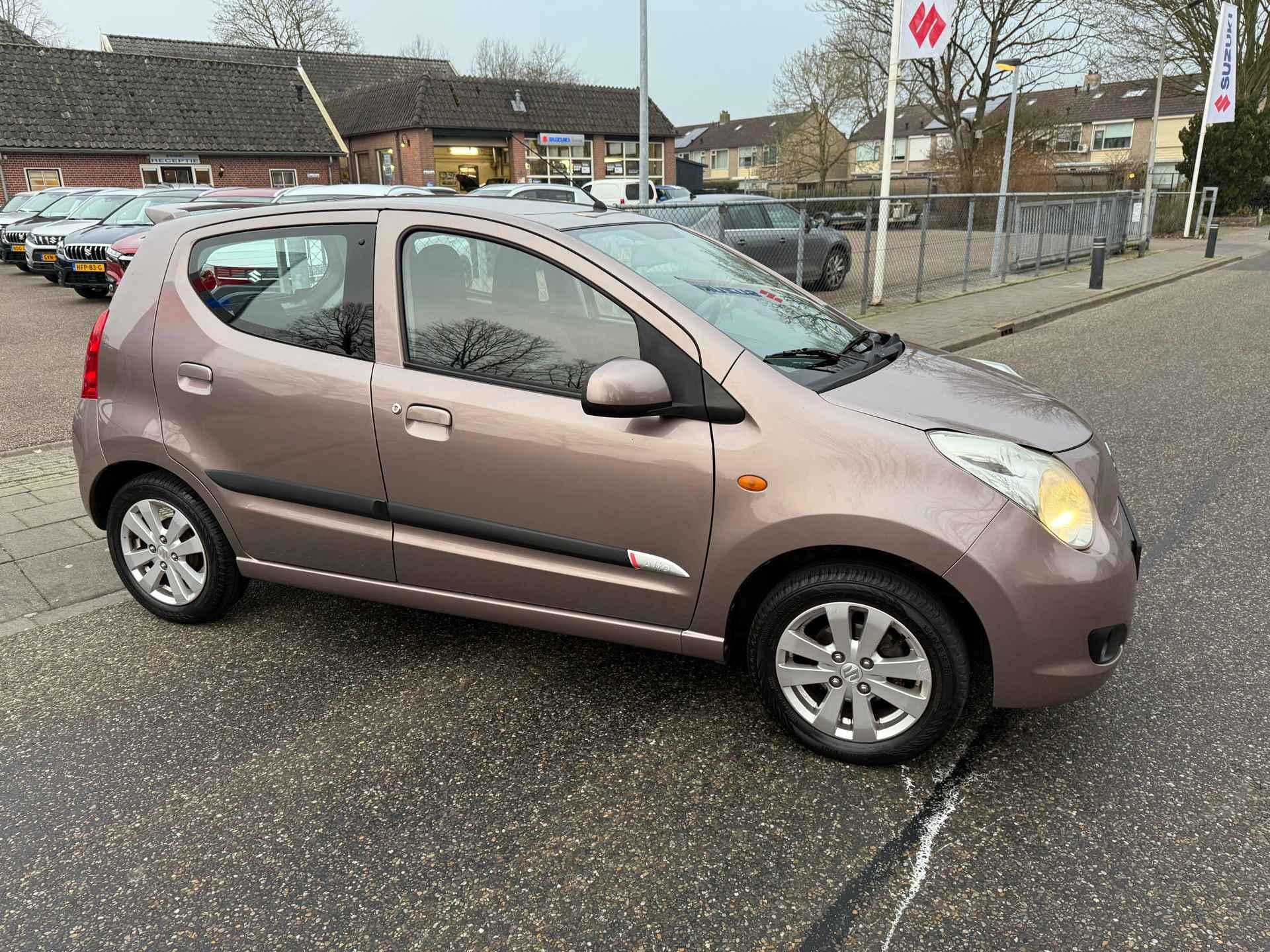 Suzuki Alto 1.0 Exclusive // Airco // Nette door ons onderhouden ALTO // Stootlijst // Spoiler // Rijklaarprijs! - 9/27