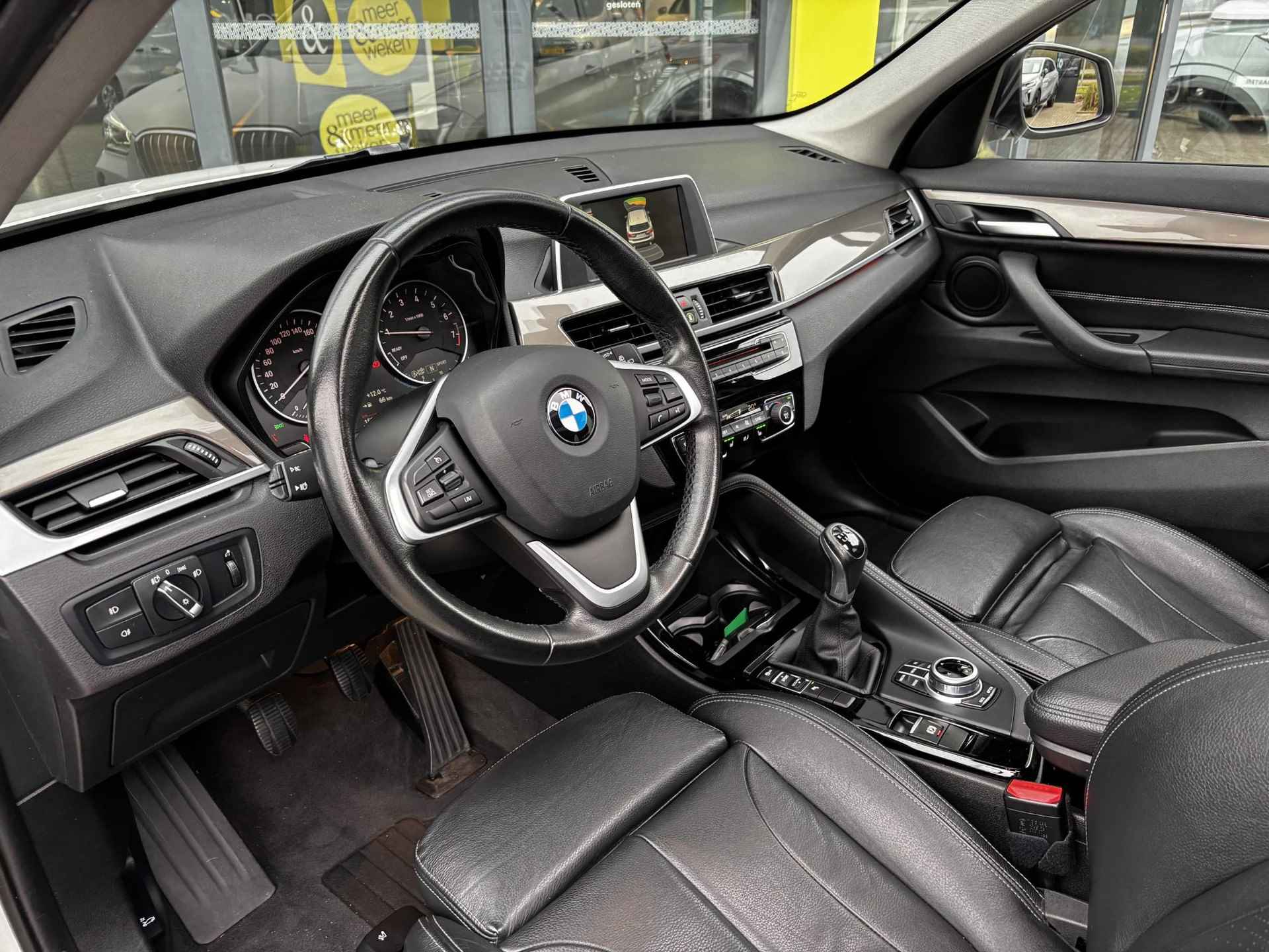 BMW X1 sDrive18i High Executive Navigatie | Cruise Control | Climate Control | Lichtmetalen velgen | Parkeersensoren | Panoramadak - 7/24