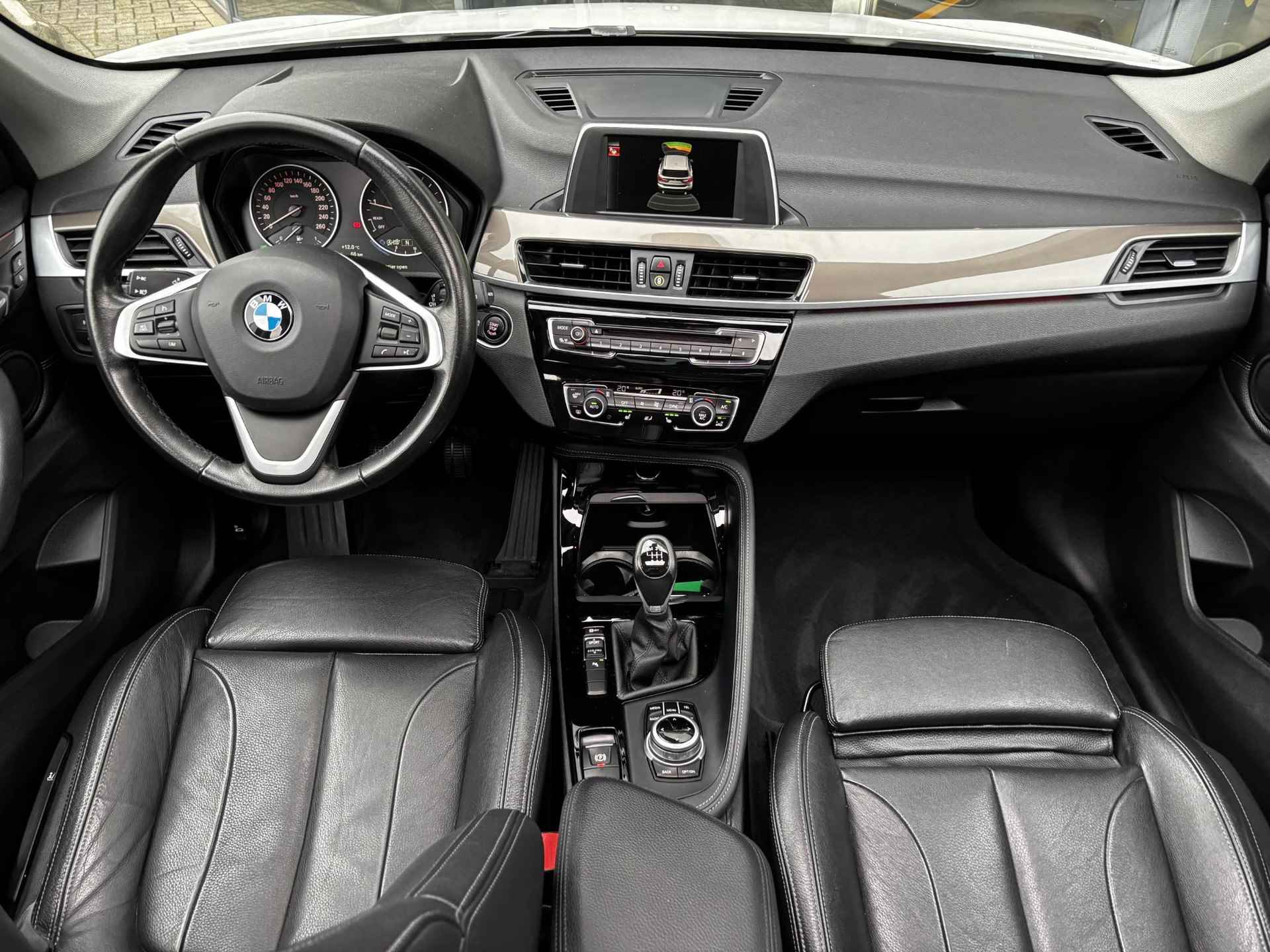 BMW X1 sDrive18i High Executive Navigatie | Cruise Control | Climate Control | Lichtmetalen velgen | Parkeersensoren | Panoramadak - 11/24