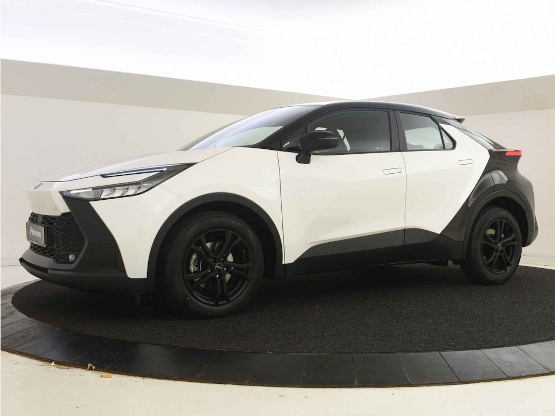 Toyota C-HR  C-HR 1.8 Hybrid Edition Bi-tone | PDC V+A | BLS | Stuur en Stoel - 10/33