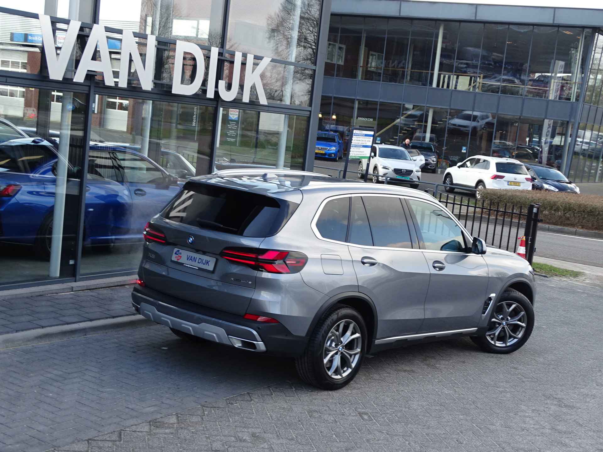 BMW X5 xDrive50e Innovation Pack Elek.Trekhaak Driv.Ass.Pro. Park.Pro. Harman/Kardon Memory-stoelen Extra getint-glas Cockpit Pro Ada. - 63/65