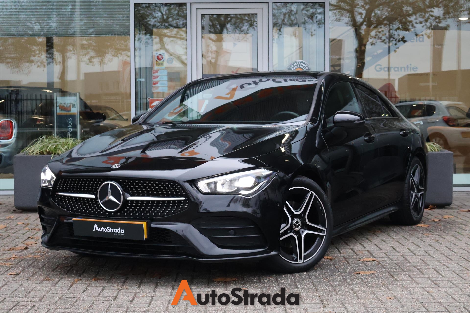 Mercedes CLA Coupé 180 AMG-Line 136pk | Sfeer | Trekhaak | DAB | Navi | Cruise | Stoelverwarming | 1e Eigenaar