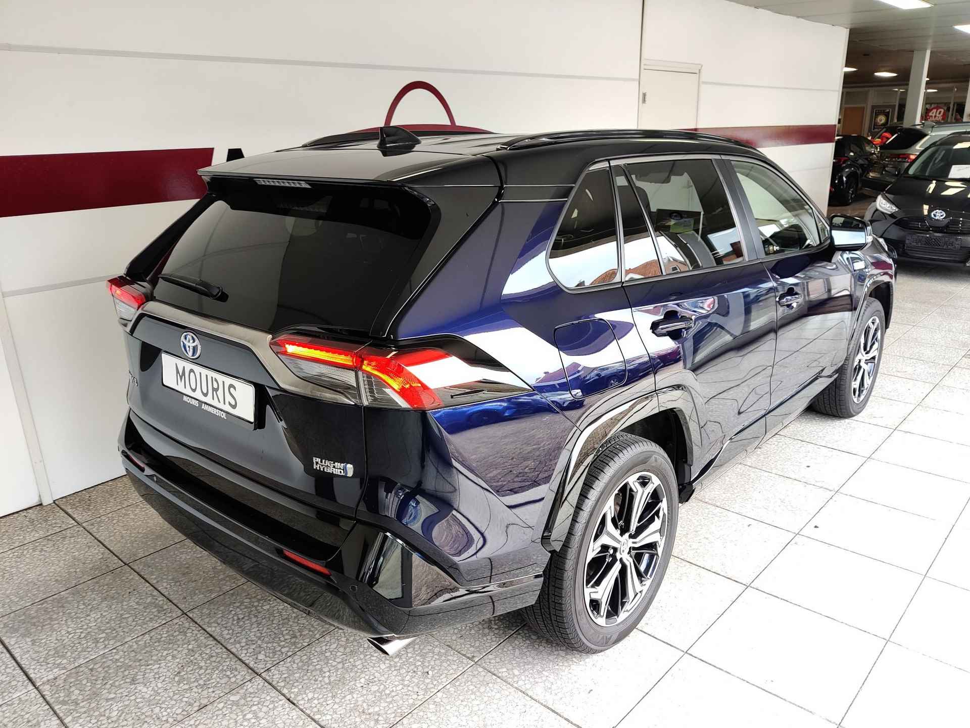 Toyota RAV4 2.5 Plug-in Hybrid AWD Bi-Tone Plus - 4/31