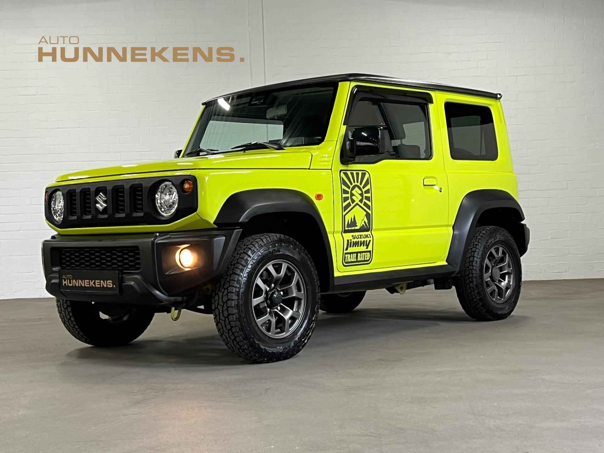 Suzuki Jimny 1.5 Stijl | Xenon | Cruise & Climate c. | Navigatie | DAB | Trekhaak - 1/29