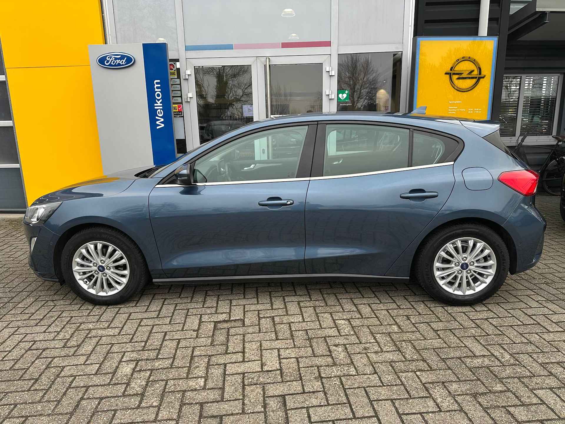 Ford Focus 1.0 125PK Titanium-X AUTOMAAT | TREKHAAK AFNEEMBAAR| STOEL- STUUR- EN VOORRUITVERWARMING| B&O SOUND| NAVIGATIE| CAMERA| ADAPTIVE - 4/38