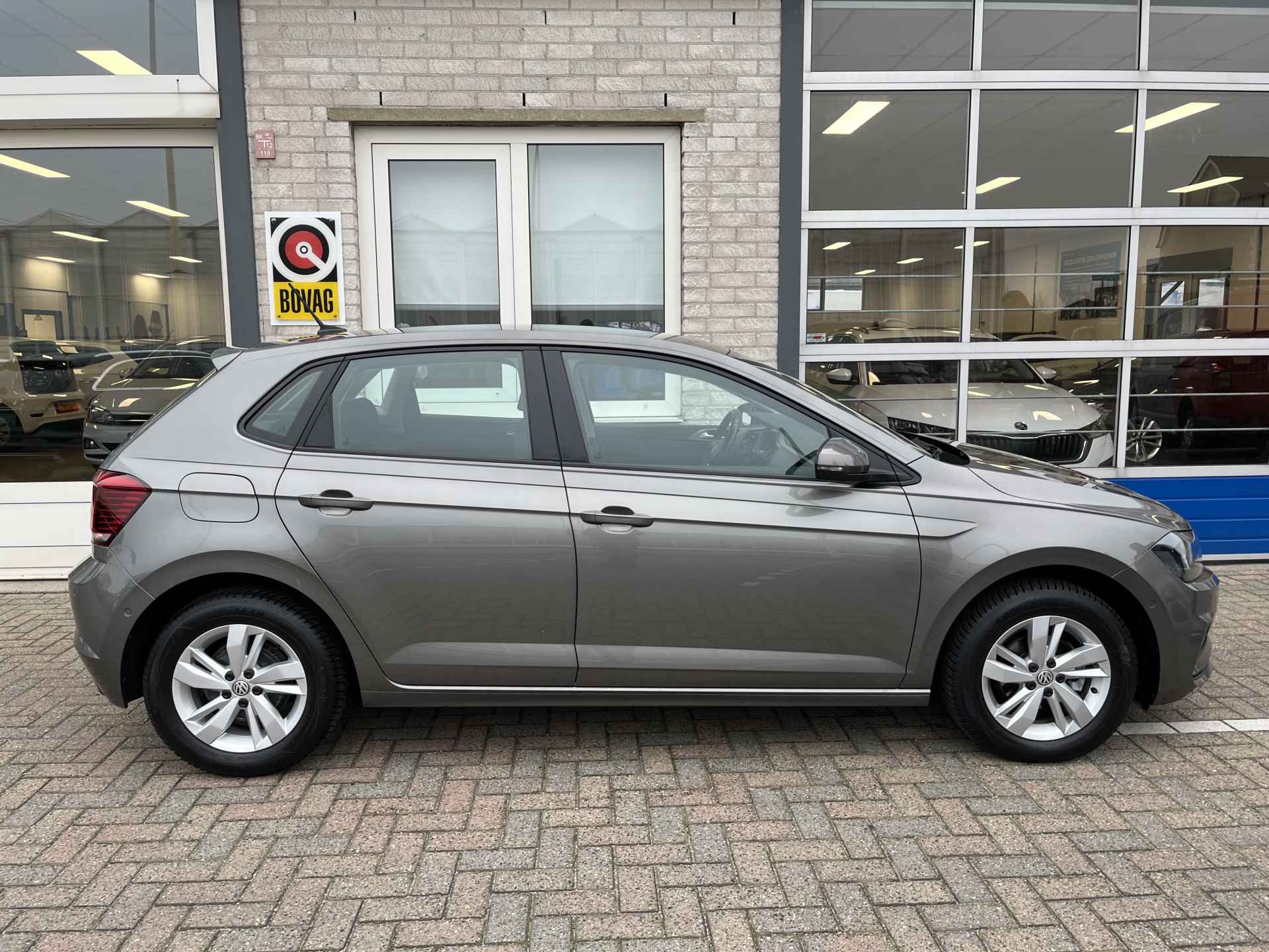 Volkswagen Polo 1.0 TSI Comfortline / AUTOMAAT/ TREKHAAK/ PARK. SENSOREN/ DODE HOEK/ ADAPT. CRUISE/ APP-CONNECT/ CLIMA/ 15" LMV - 32/36