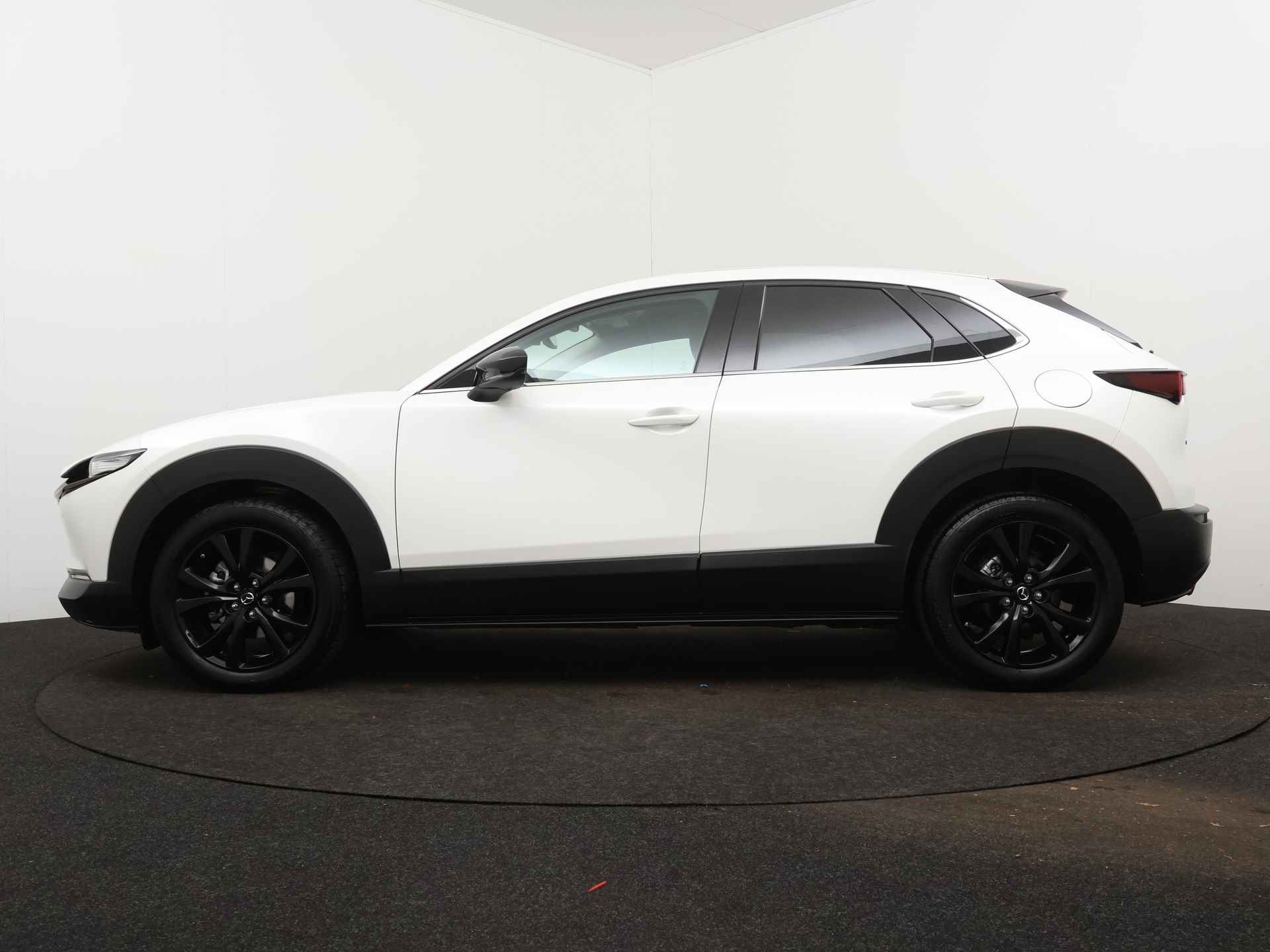 Mazda CX-30 2.0 e-SkyActiv-G M Hybrid Nagisa Limited | Leder/stof | Navigatie | Parkeersensoren | BOSE | Stoelverwarming | Dodehoek Ass. | - 4/47