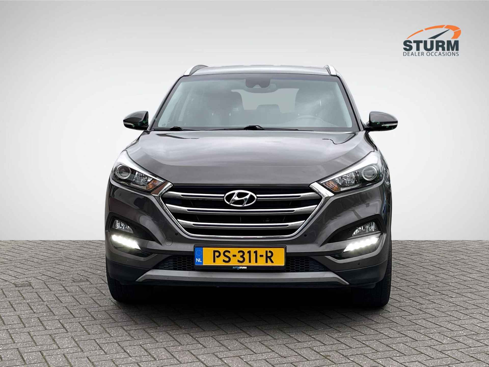 Hyundai Tucson 1.6 GDi Comfort | Trekhaak | Navigatie | Camera | Stoelverwarming | Cruise & Climate Control | 19'' Velgen | Rijklaarprijs! - 2/27