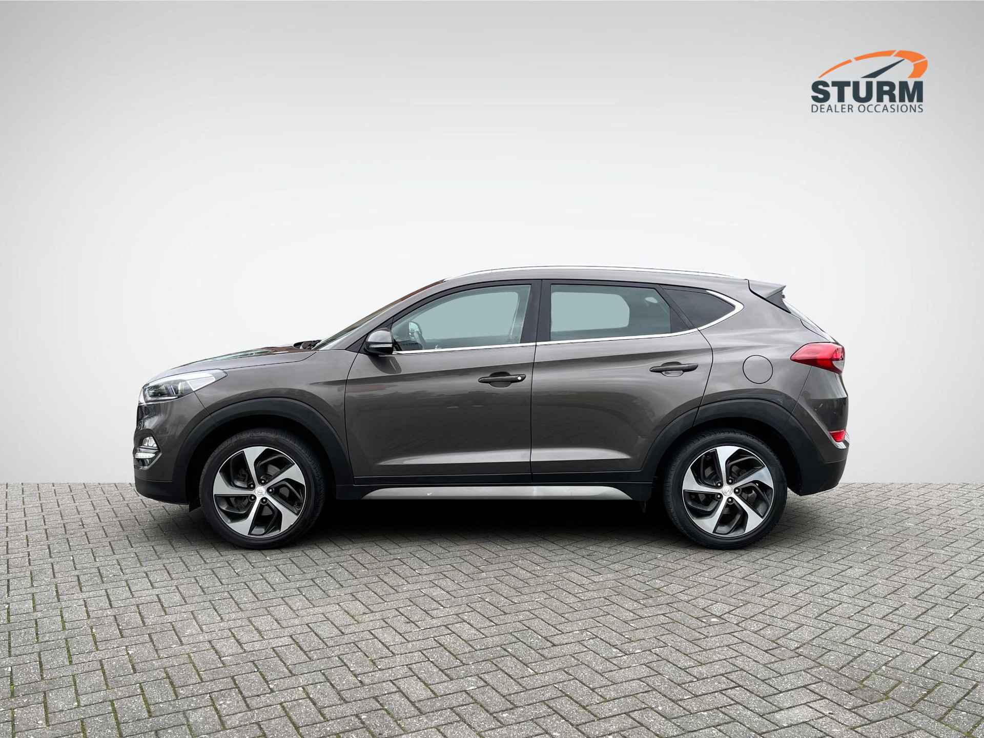 Hyundai Tucson 1.6 GDi Comfort | Trekhaak | Navigatie | Camera | Stoelverwarming | Cruise & Climate Control | 19'' Velgen | Rijklaarprijs! - 7/27