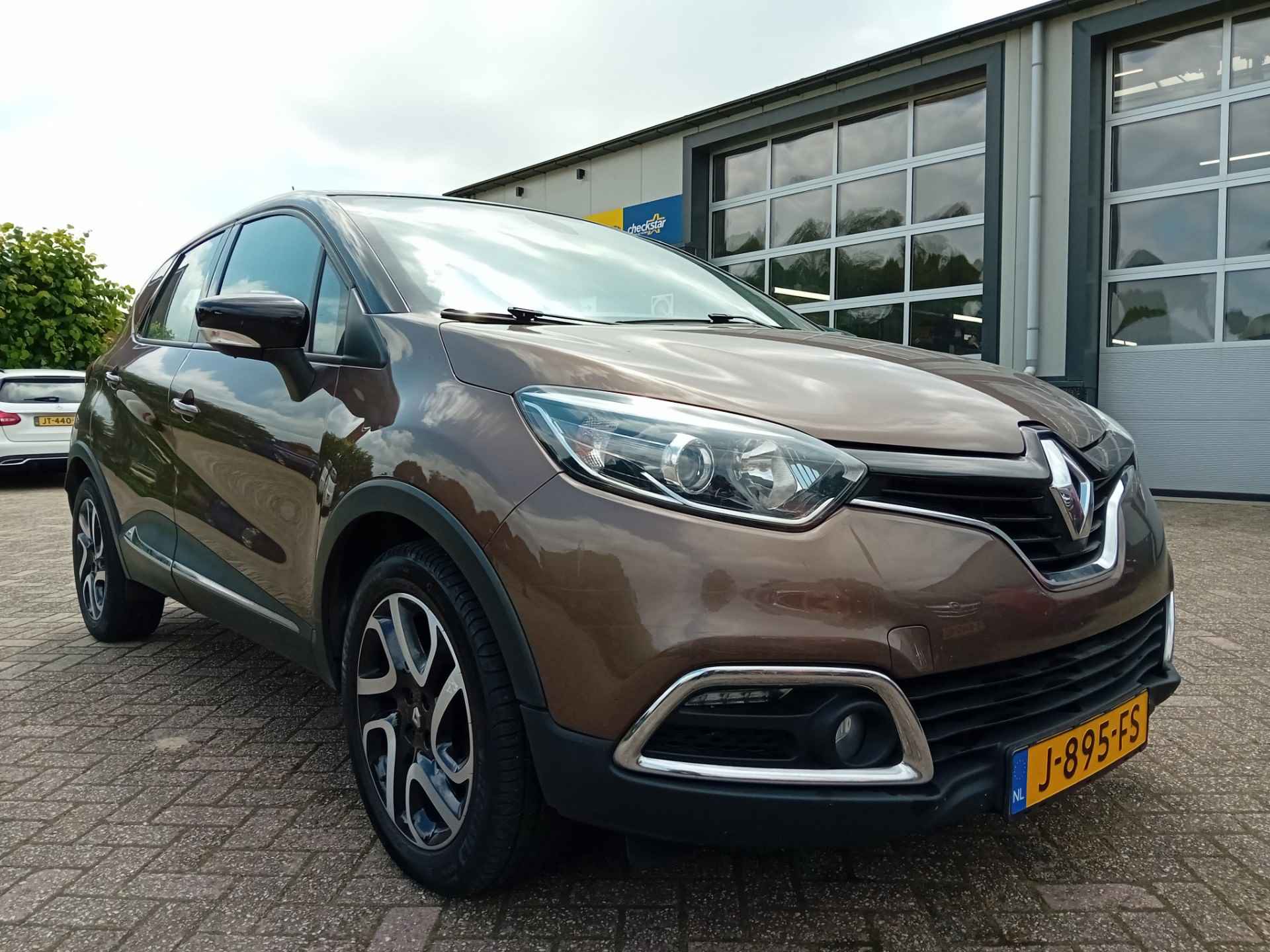 Renault Captur 0.9 TCe Helly Hansen - Navigatie - Pdc - 1/14