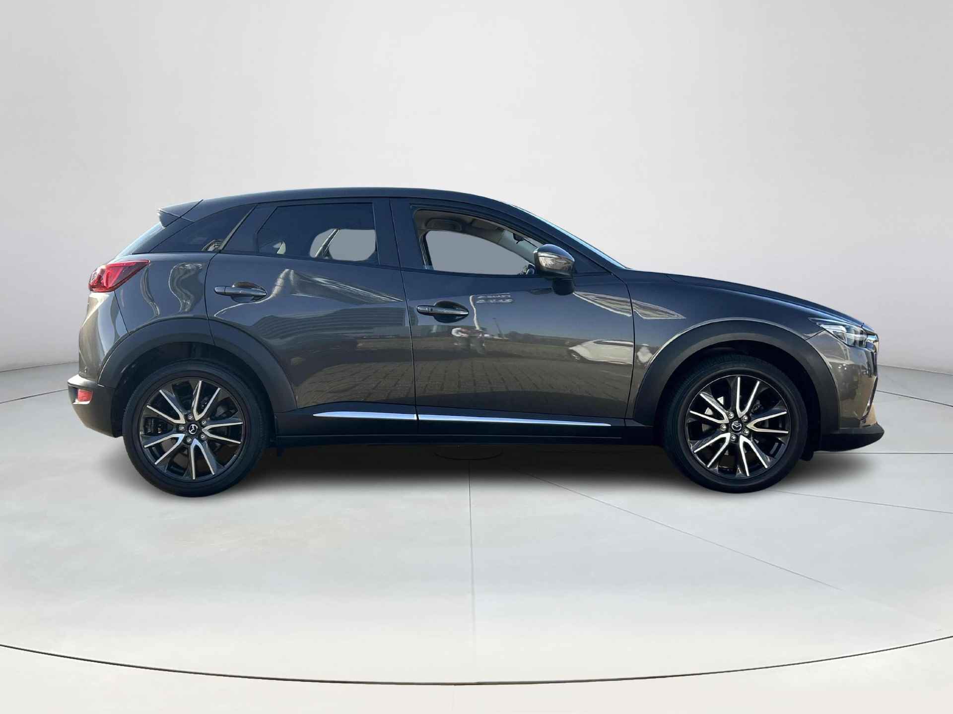 Mazda CX-3 2.0 SkyActiv-G 120 GT-M | Rijklaarprijs! | Leder | Camera | Stoelverwarming | Navigatie | Keyless start & entry | Inclusief 12 mnd Bovag garantie! | - 7/26