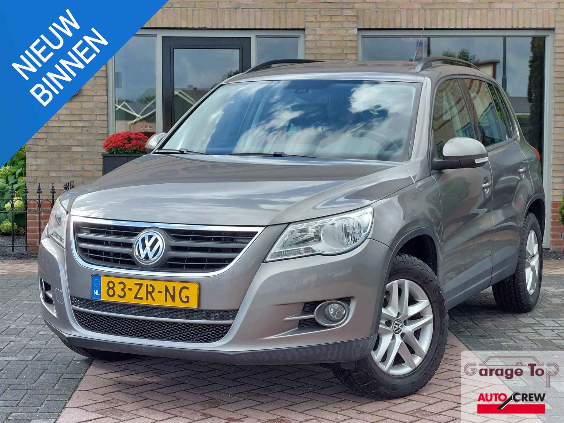 Volkswagen Tiguan 1.4 TSI Comfort&Design 4Motion | Trekhaak | 100% onderhouden | NAP - 1/37