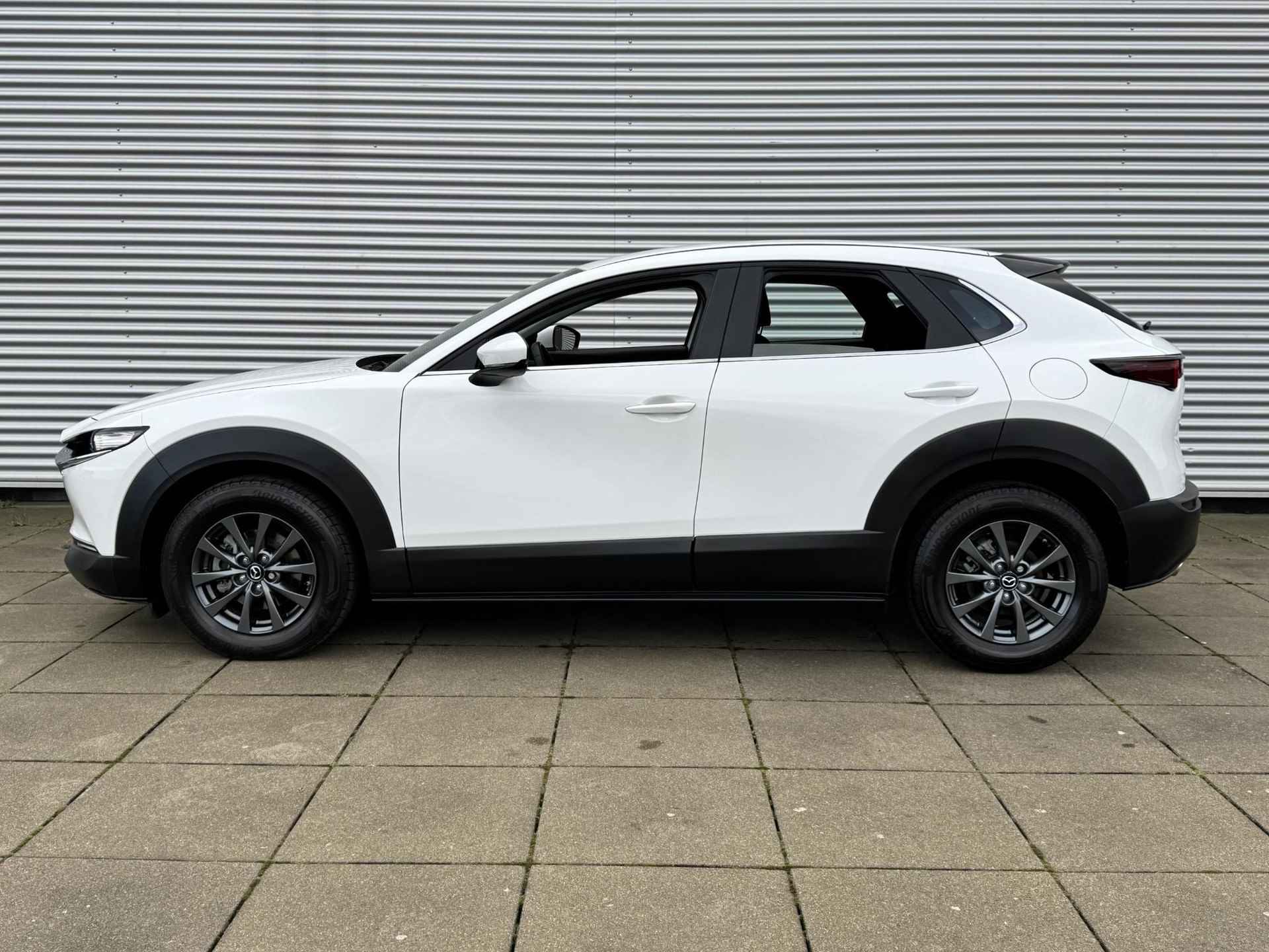 Mazda CX-30 2.0 e-SkyActiv-G M Hybrid | Achteruitrij camera | Cruise control | Apple CarPlay | Keyless Entry - 16/24