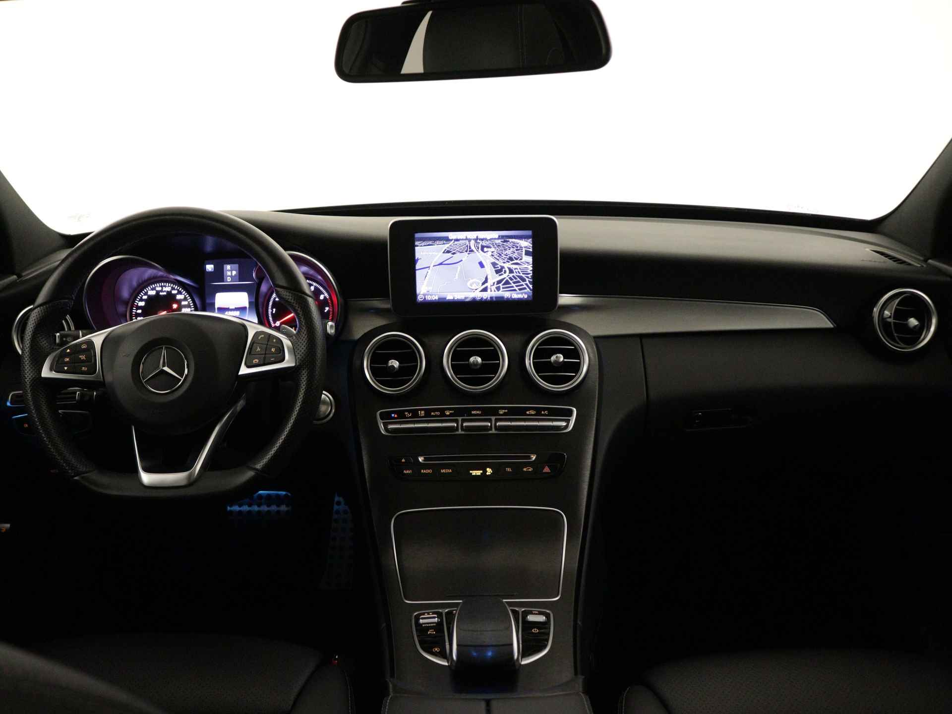 Mercedes-Benz C-Klasse 180 Premium AMG | Panoramadak | AMG Styling | Panamera Grille | Achteruitrijcamera | Leder | Inclusief 24 maanden Mercedes-Benz Certified garantie voor Europa. - 5/40