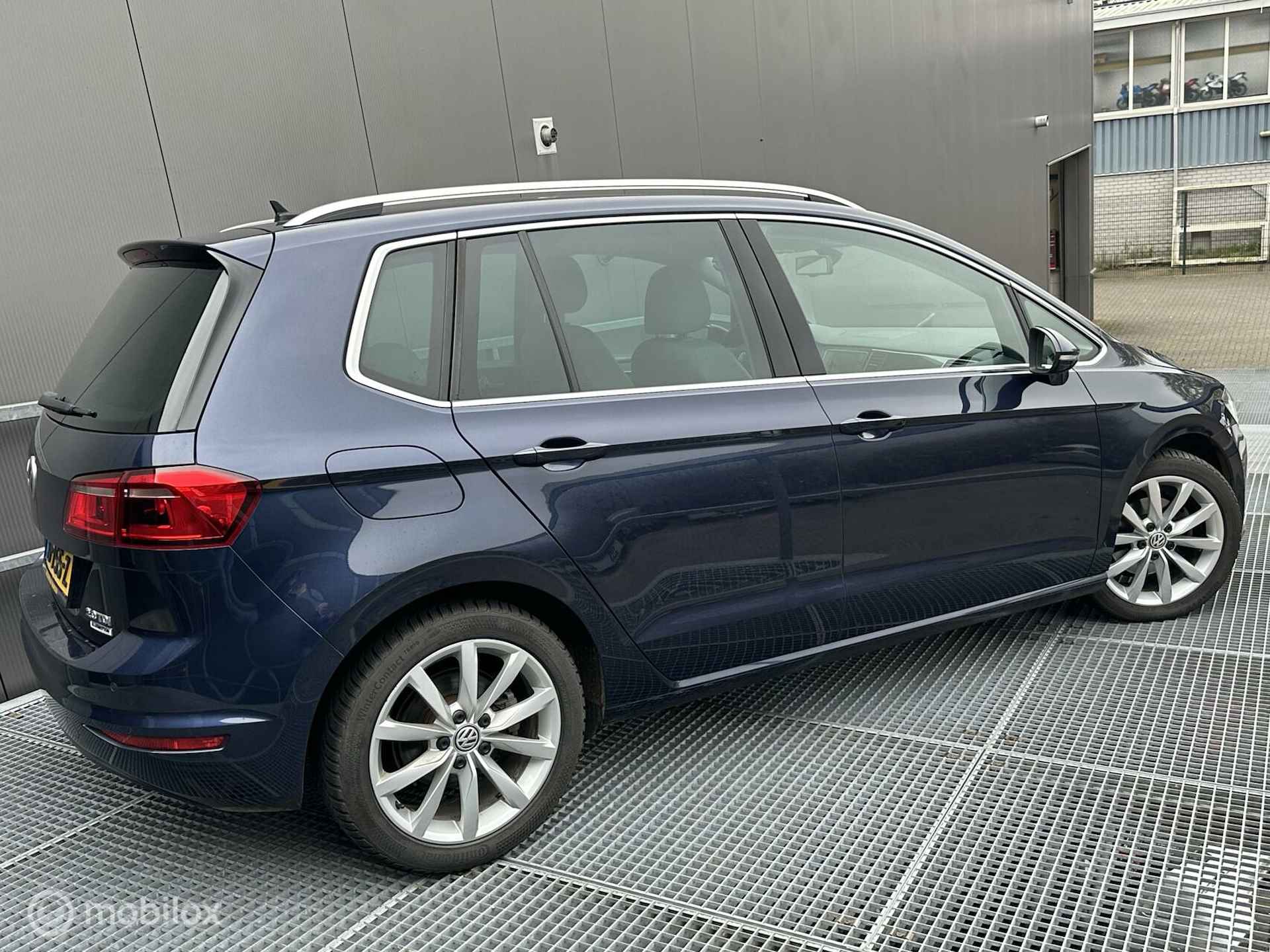 Volkswagen Golf Sportsvan 2.0 TDI Highline - 24/25