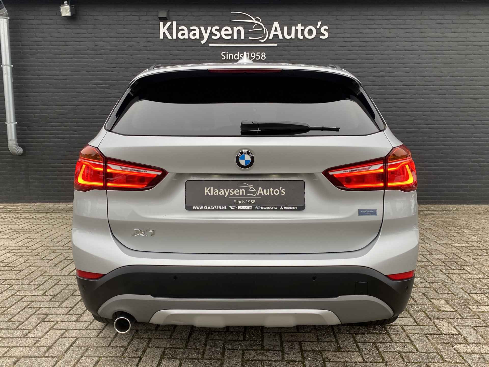 BMW X1 sDrive18i 140 pk Executive Edition AUT. | 1e eigenaar | navigatie | bruin leder interieur | trekhaak | lichtmetalen velgen 18'' - 7/46