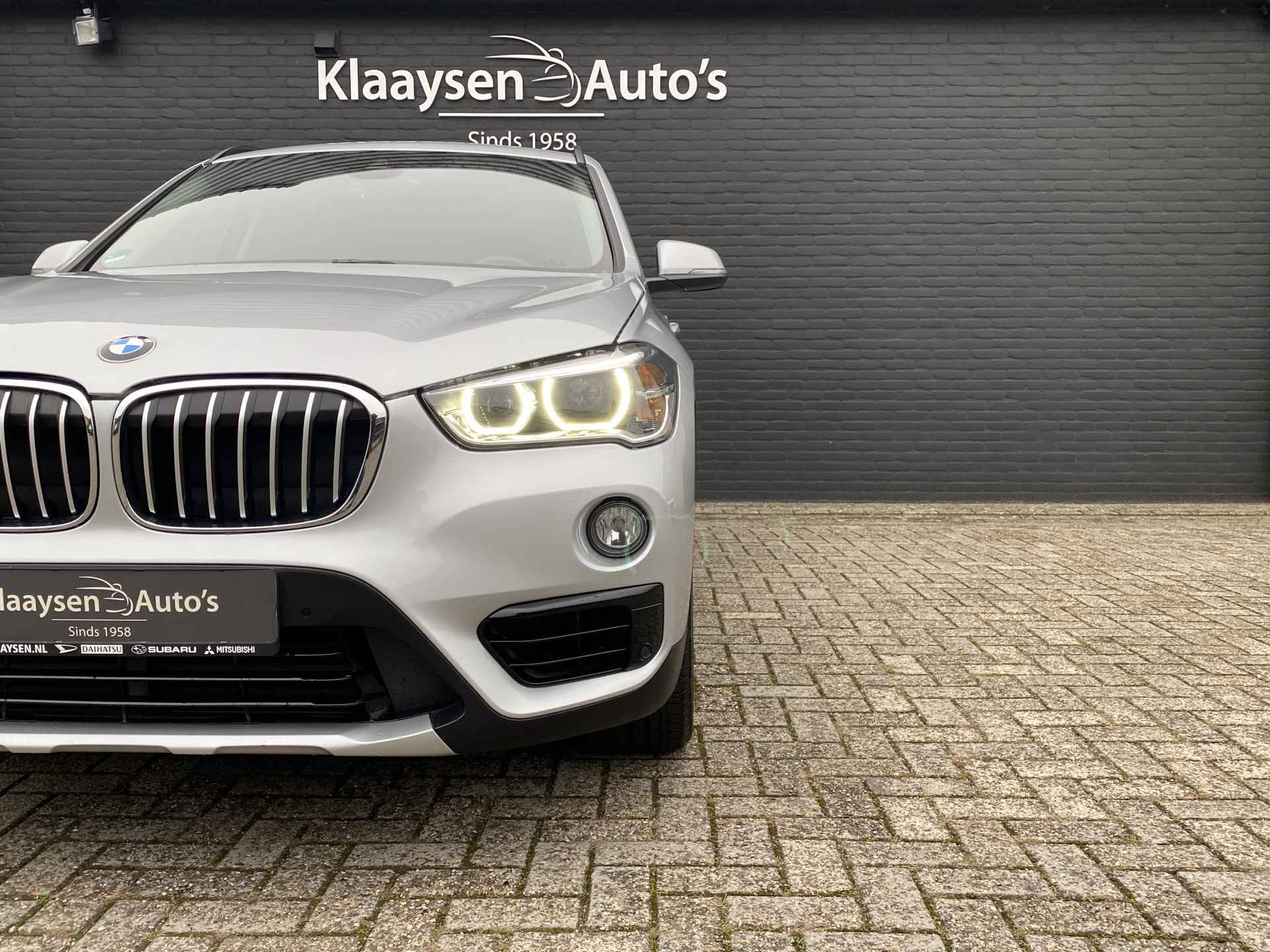 BMW X1 sDrive18i 140 pk Executive Edition AUT. | 1e eigenaar | navigatie | bruin leder interieur | trekhaak | lichtmetalen velgen 18'' - 12/46