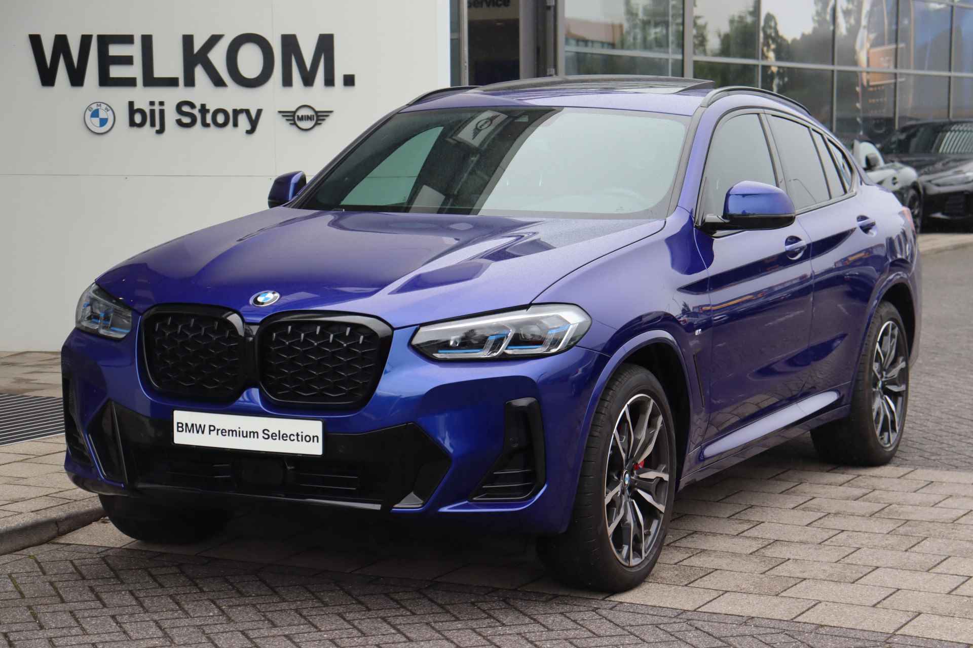 BMW X4 xDrive20i High Executive M Sport Automaat / Panoramadak / Trekhaak / Laserlight / Sportstoelen / Active Cruise Control / Parking Assistant / Comfort Access - 7/37