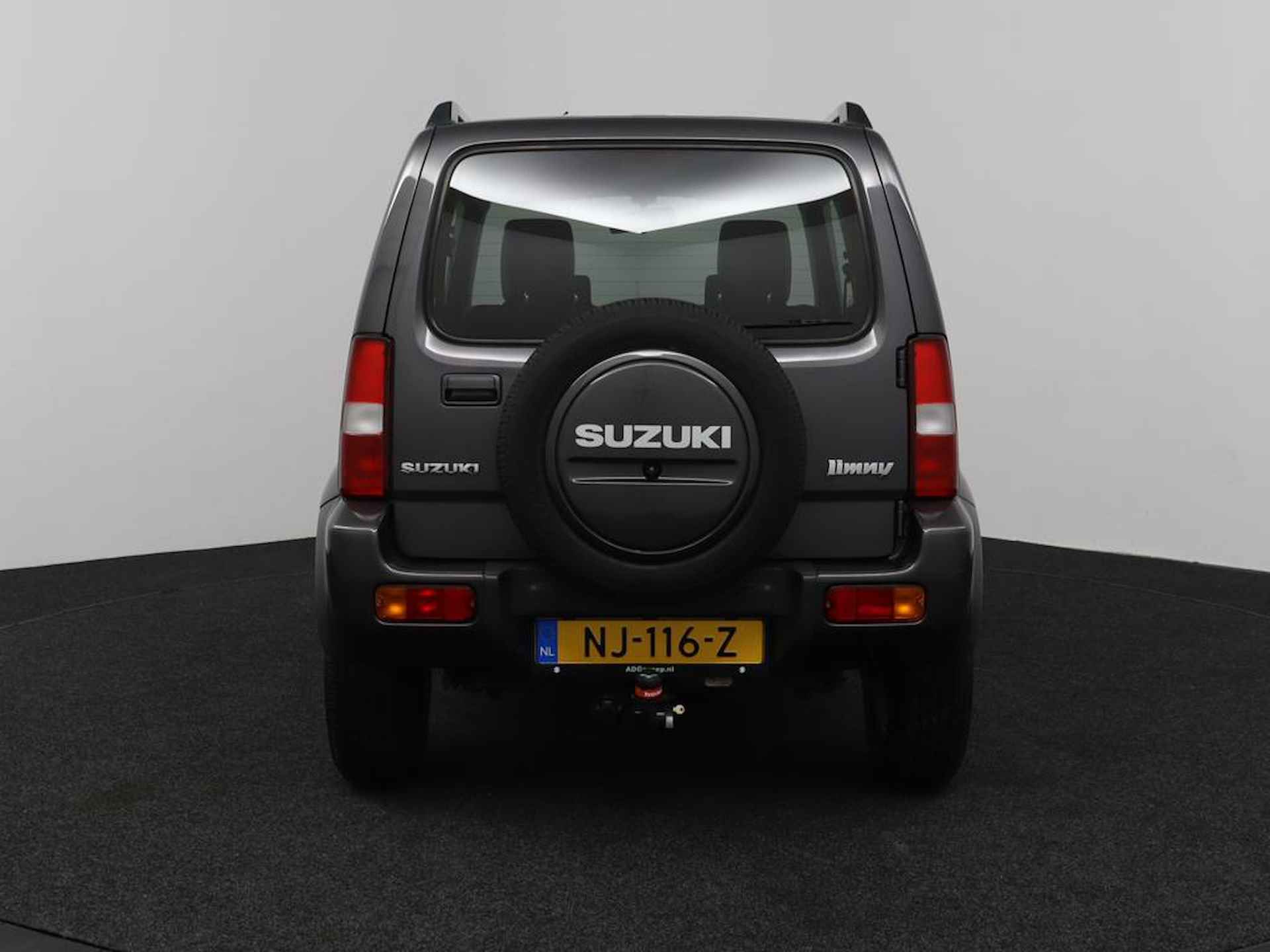 Suzuki Jimny 1.3 Exclusive | 4X4 | Airco | Lederen bekleding | Trekhaak | - 28/40