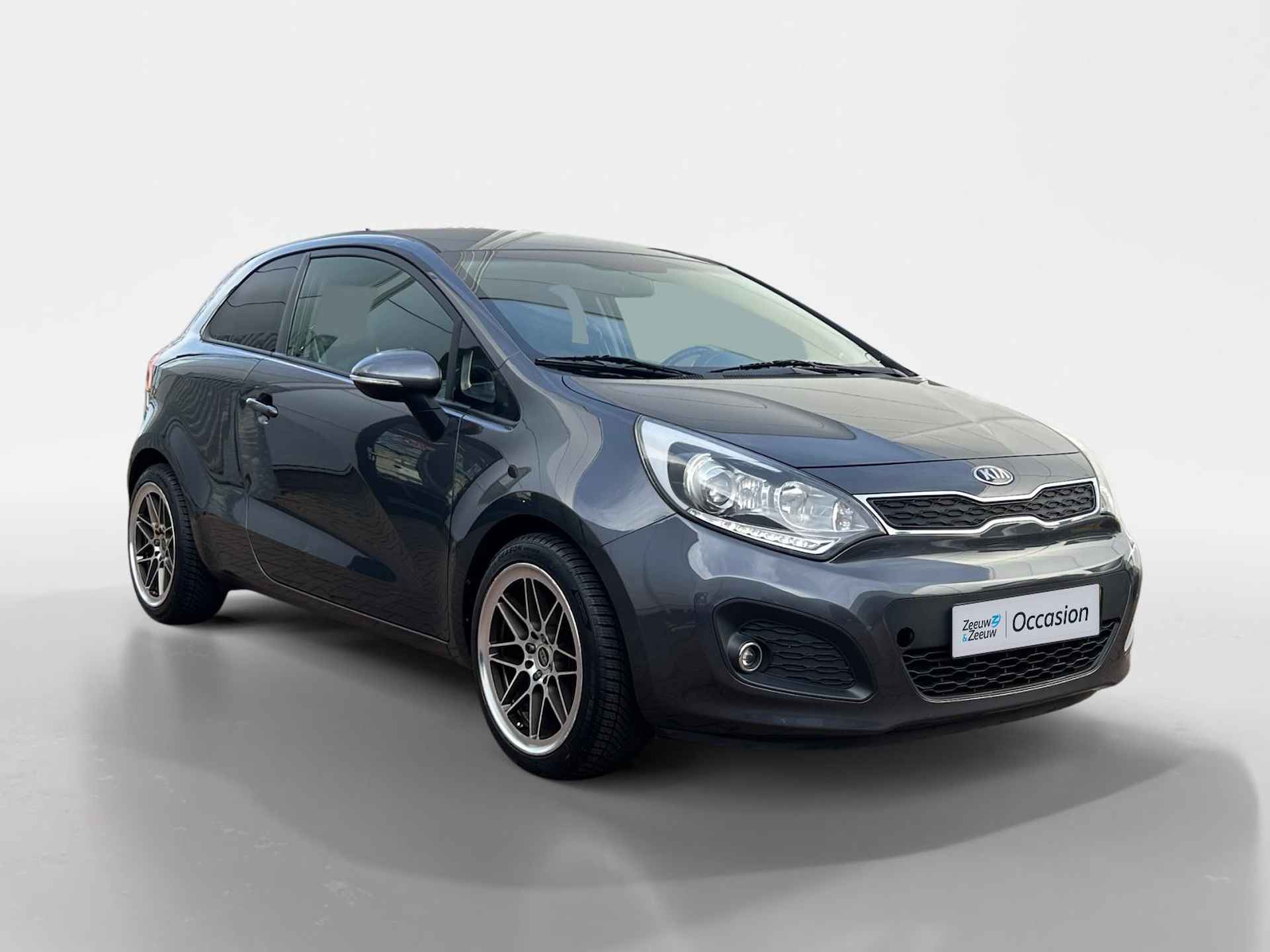 Kia Rio 1.2 CVVT Super Pack | Keyless Start | Climate Control | Bluetooth | Navigatie | All Season Wielen | Onderhoudsboekjes Aanwezig | 12 Maanden Bovag Garantie - 7/36