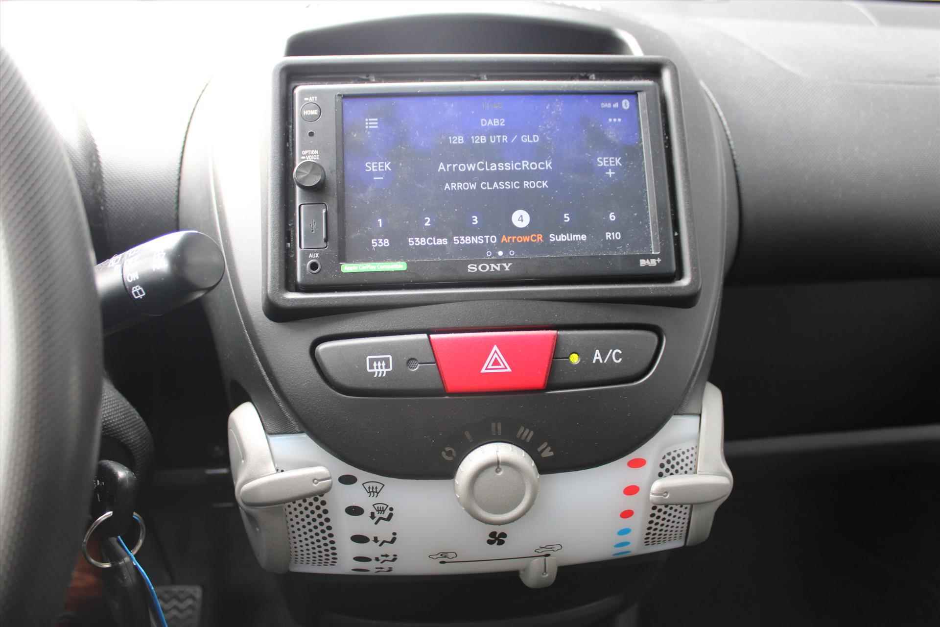 Peugeot 107 1.0 68PK 5D Active  Airco | Carplay | DAB | Bluetooth | JBL Speakers NL Auto NAP - 7/16