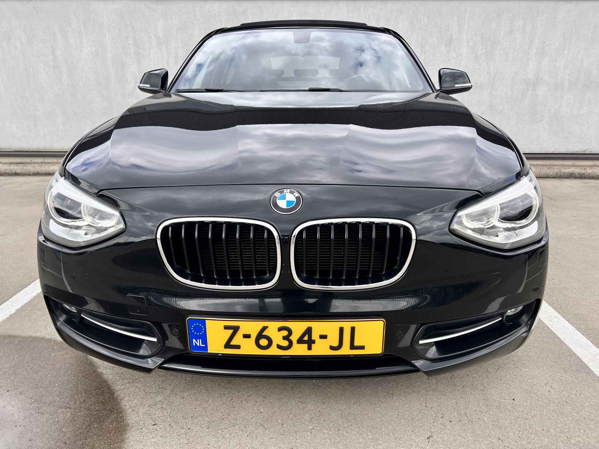 BMW 1-serie 116i Sport Edition 100KW | Navi | glazen Schuif-Kantel dak | Individual pakket | Sport-Line uitvoering | % Bovag Occasion Partner % - 11/49