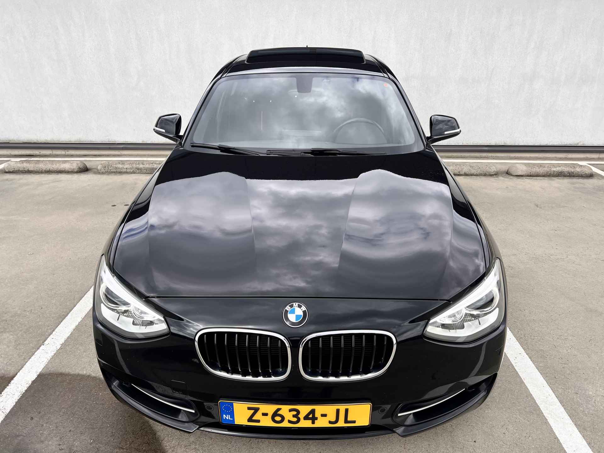 BMW 1-serie 116i Sport Edition 100KW | Navi | glazen Schuif-Kantel dak | Individual pakket | Sport-Line uitvoering | % Bovag Occasion Partner % - 12/49