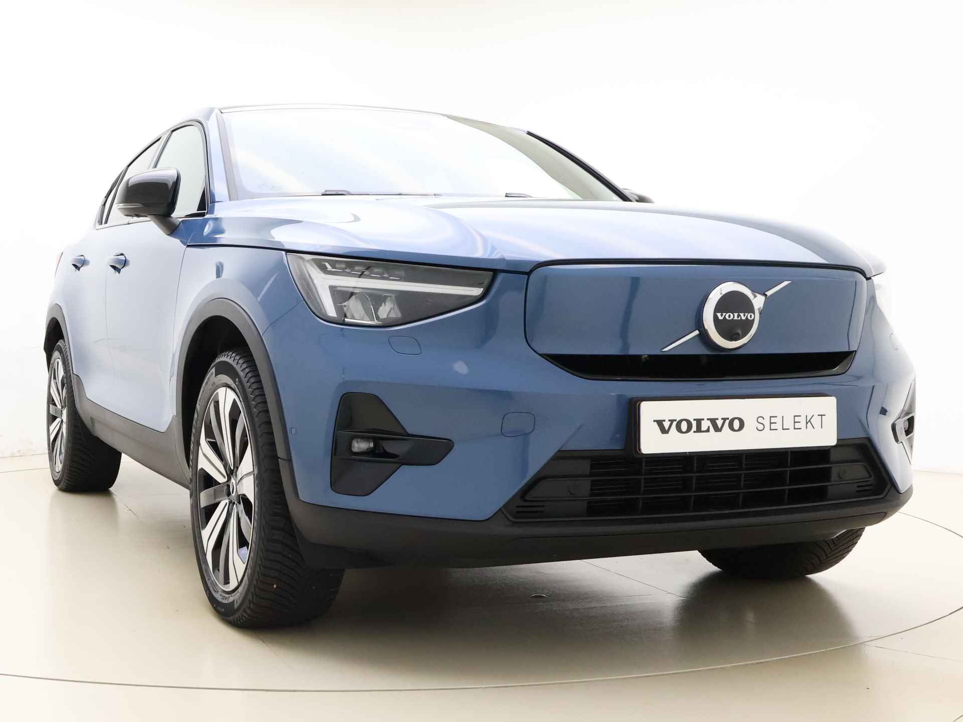 Volvo C40 Twin 408pk Ultimate 78 kWh / 1e Eig. / Nubuck / Fjord Blue / Getint glas / Adapt. Cruise / BLIS / 19'' + All Season / Keyless / Panoramadak / - 21/37