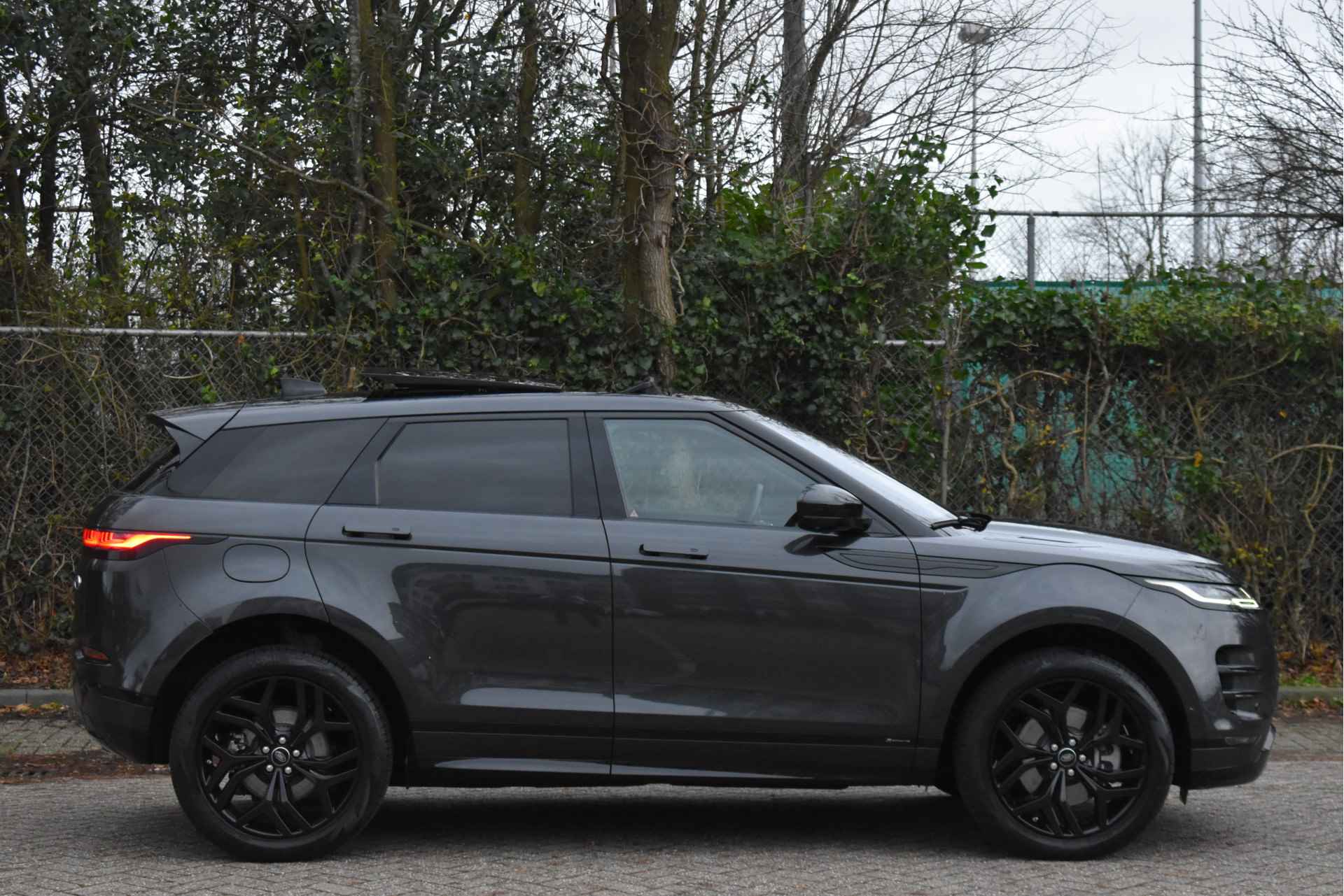 Land Rover Range Rover Evoque 1.5 P300e AWD R-Dynamic SE | Pano.dak | 360 gr.camera | Keyless | Elekt.stoelen | Carplay | Full LED | 20" Velgen - 7/61