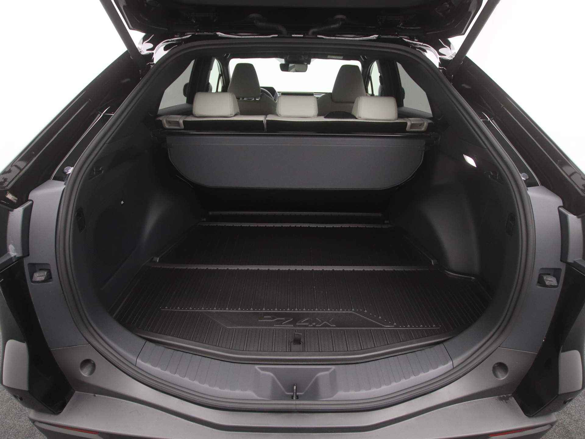 Toyota Bz4x Premium 71 kWh *Nieuw* | Solar Roof | Grijs Leder Interieur | Direct Leverbaar! - 30/47