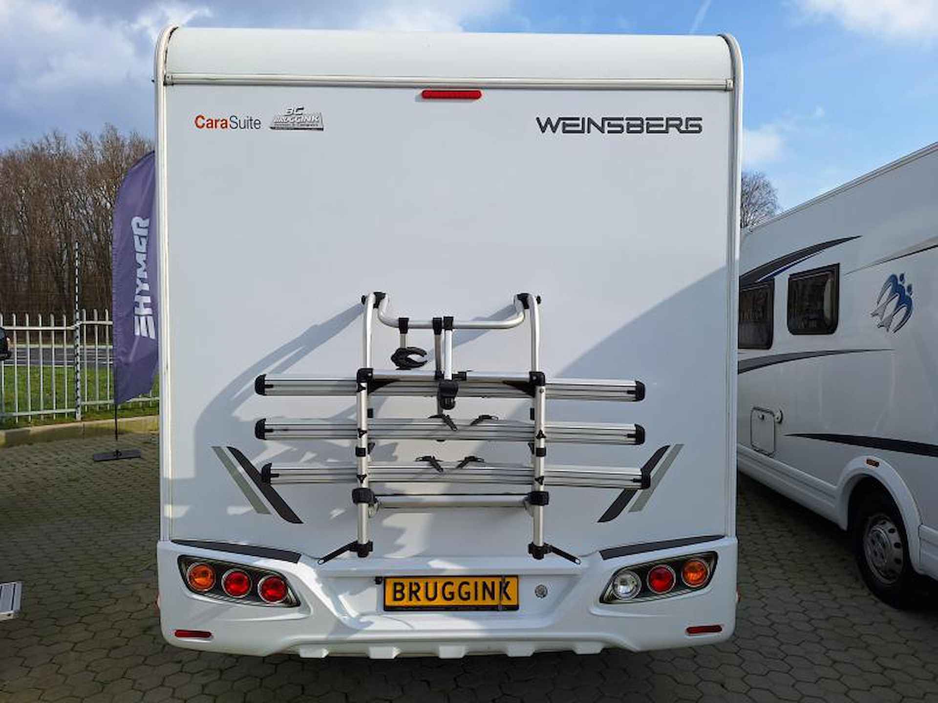 Weinsberg CaraSuite 700 ME - Lengte bedden + Hefbed - 18/23