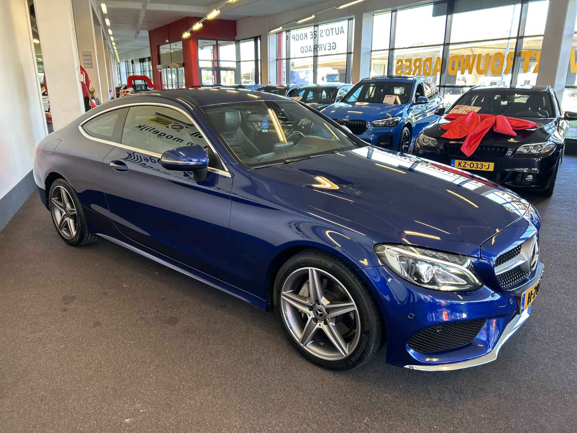 Mercedes-Benz C-Klasse Coupé 180 AMG Exclusive | Automaat | Lederen bekleding | Dealer onderhouden | Adaptief onderstel | Achteruitrijcamera | Cruise c - 9/33