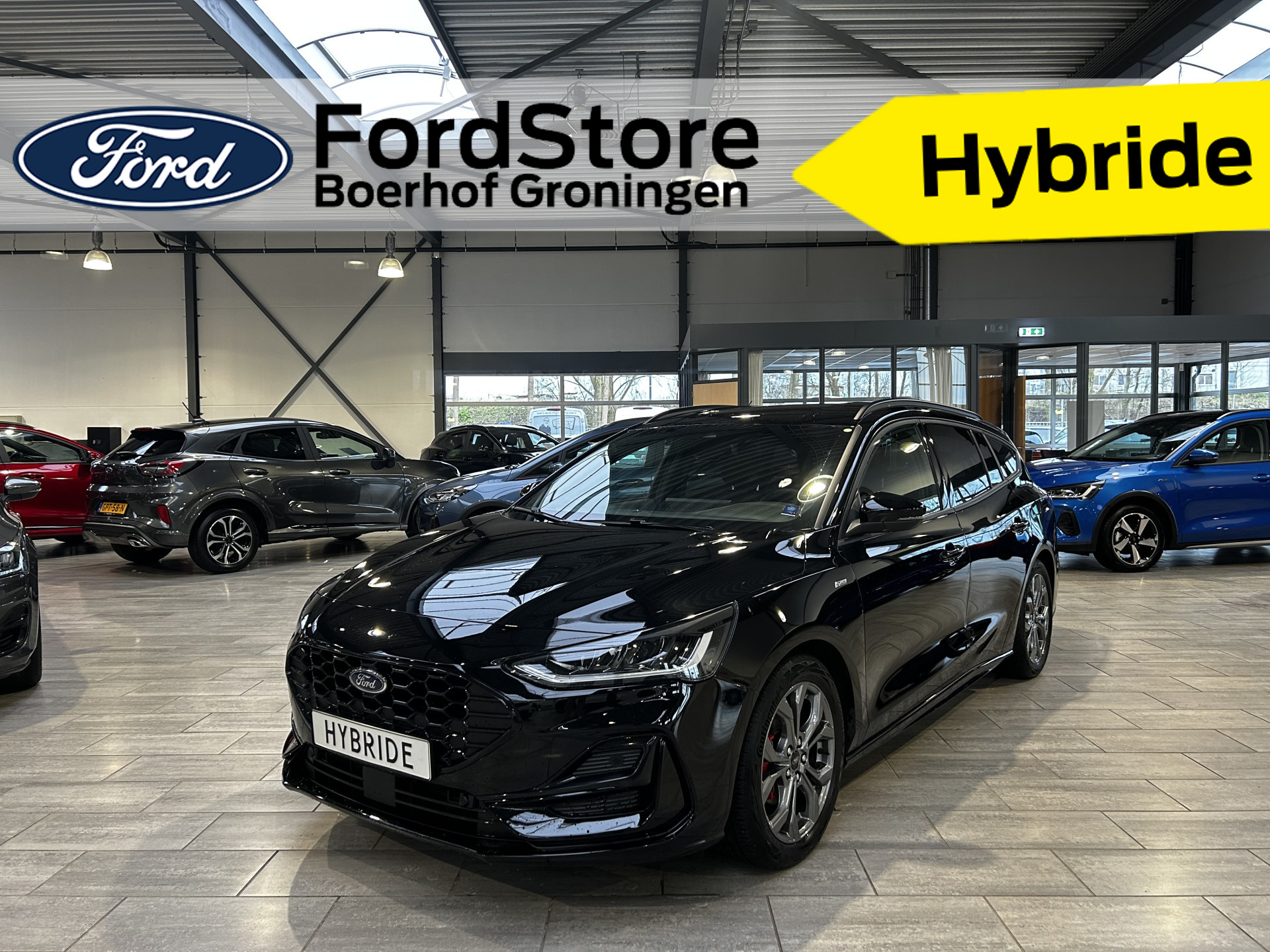 Ford FOCUS Wagon EcoBoost Hybrid 125 pk ST Line | Winter Pack | Adapt. Cruise | Lederen bekl. | Groot navi | garantie tm 2028