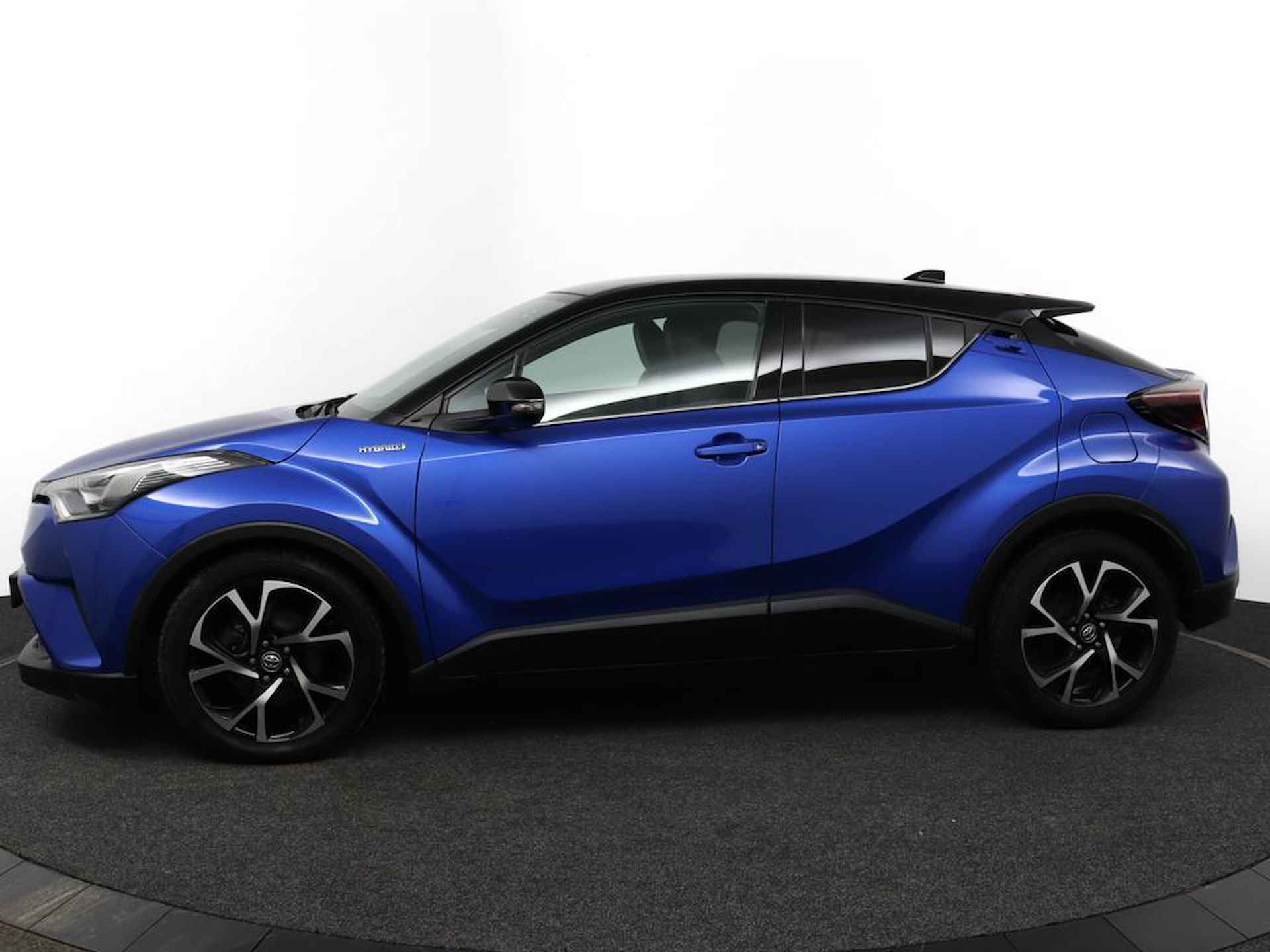 Toyota C-HR 1.8 Hybrid Adventure Bi-Tone | Leder | JBL | Stoelverwarming | Camera | Climate Control - 3/51