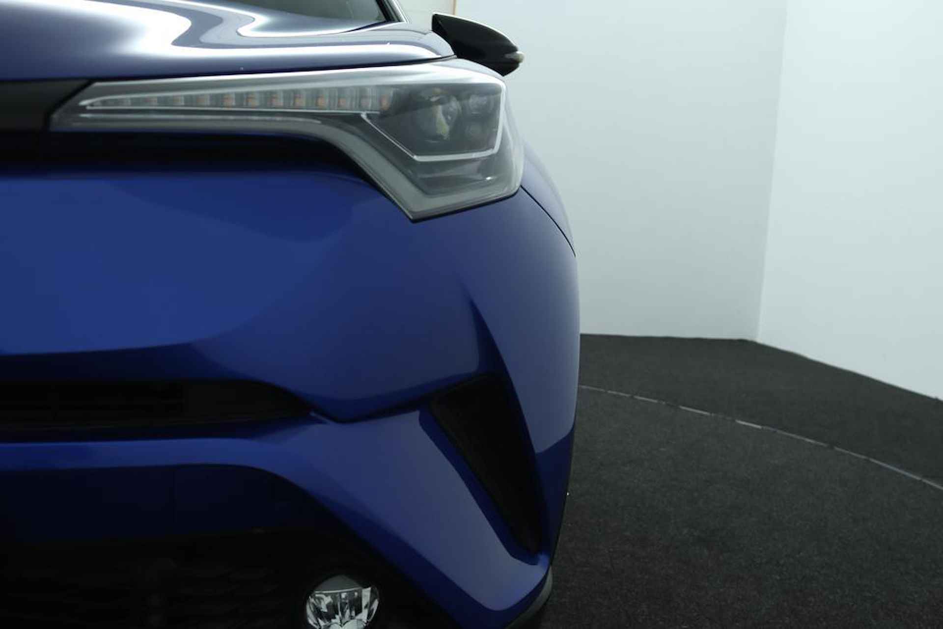 Toyota C-HR 1.8 Hybrid Adventure Bi-Tone | Leder | JBL | Stoelverwarming | Camera | Climate Control - 41/51