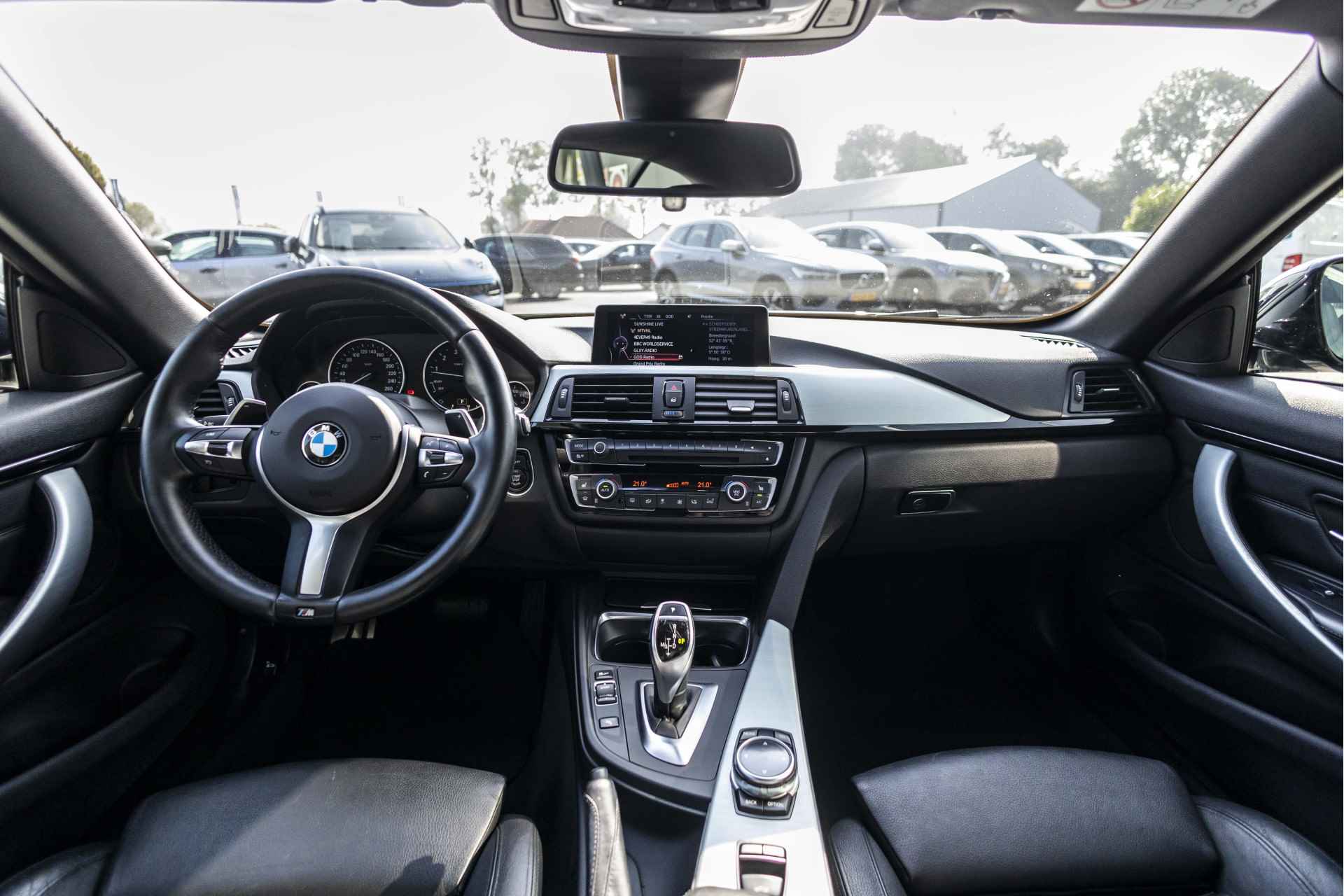 BMW 4 Serie Cabrio 428i xDrive High Executive | M-Sport | HUD | Memory | 19" | Camera - 24/42