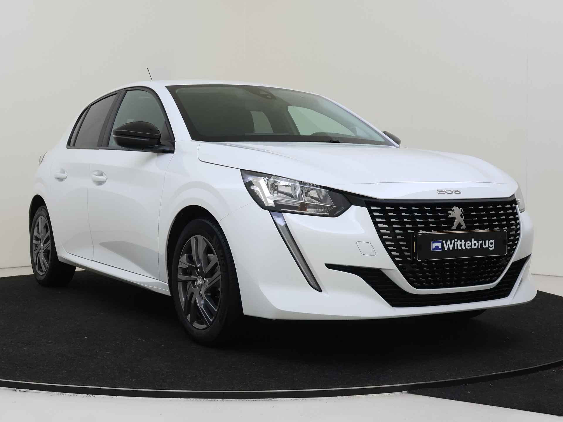 Peugeot 208 1.2 75 Active Pack | Parkeerhulp | Navigatie | Airco | Velgen | - 4/35