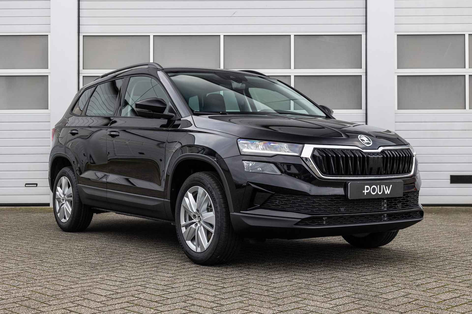 Skoda Karoq 1.5 TSI 150pk DSG ACT Business Edition | Winter Pakket | Navigatie Pakket - 9/49