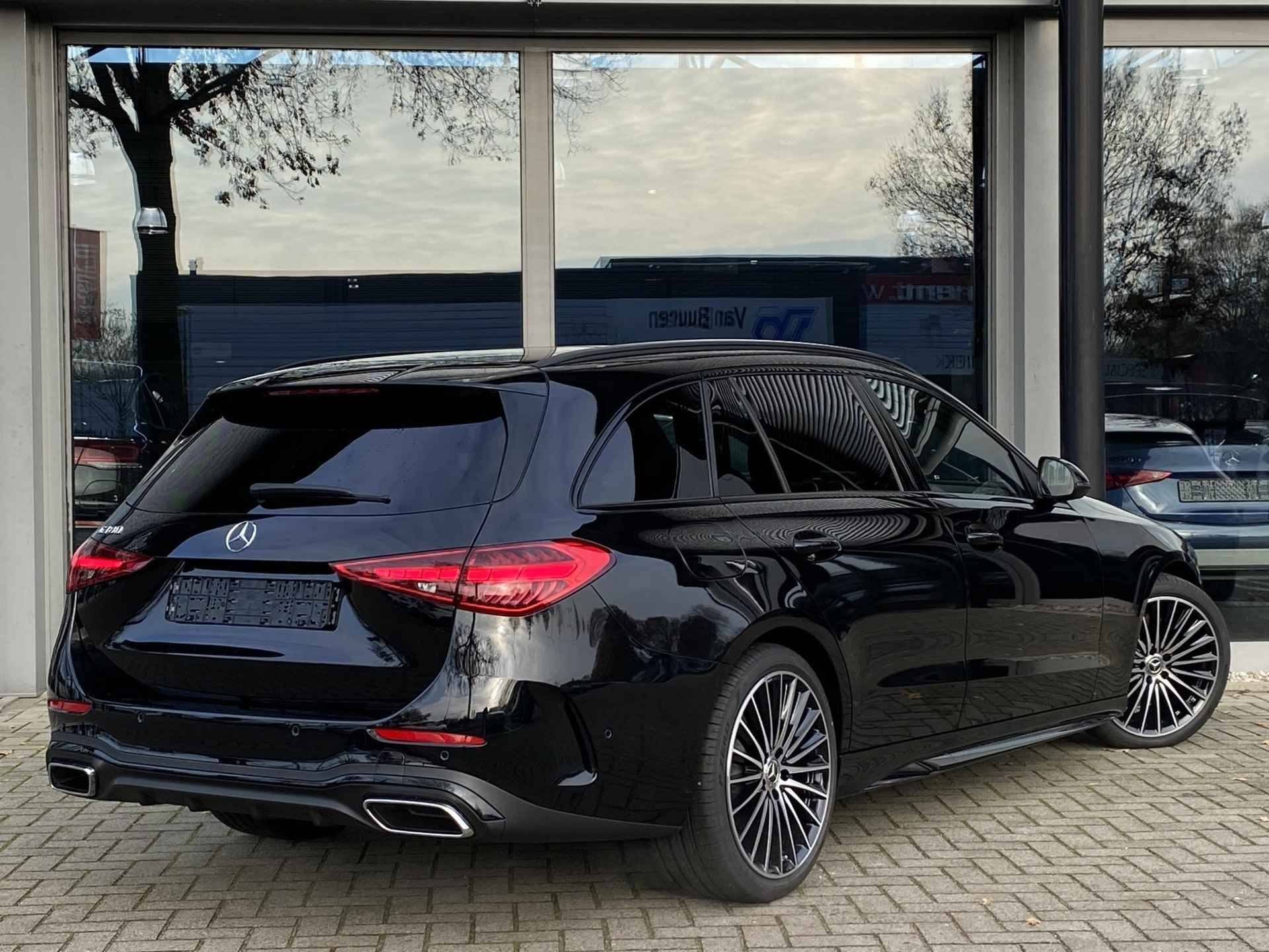 Mercedes-Benz C-klasse 180 Estate AMG Line | Panoramadak | Memory pakket | High-performance LED | Dodehoek-assistent | Sfeerverlichting | Nightpakket | 19" Multispaaks | - 7/32