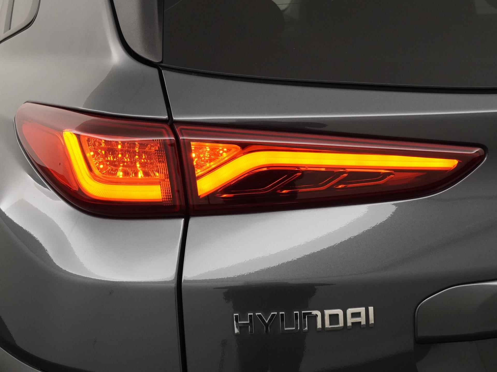 Hyundai KONA EV Comfort 64kWh 21.945,- na subsidie | 3-fase | Navigatie | Zondag Open! - 21/39