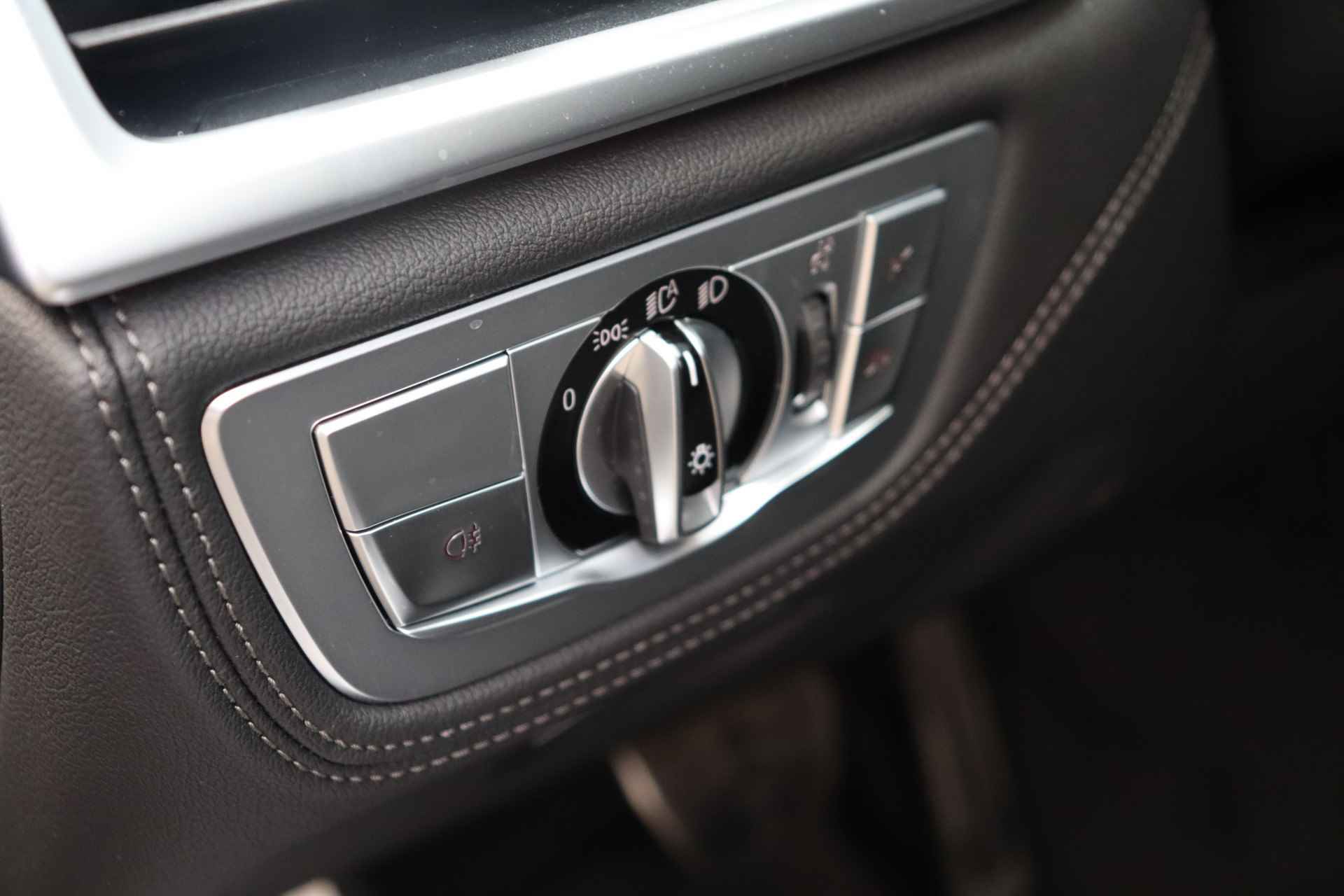 BMW 7 Serie 740d xDrive High Executive M-Sport Automaat / Panoramadak / Laserlicht / Harman Kardon / Adaptive Cruise Control / Surround View / Stoelventilatie / DAB / Softclose / Comfort Access - 29/34