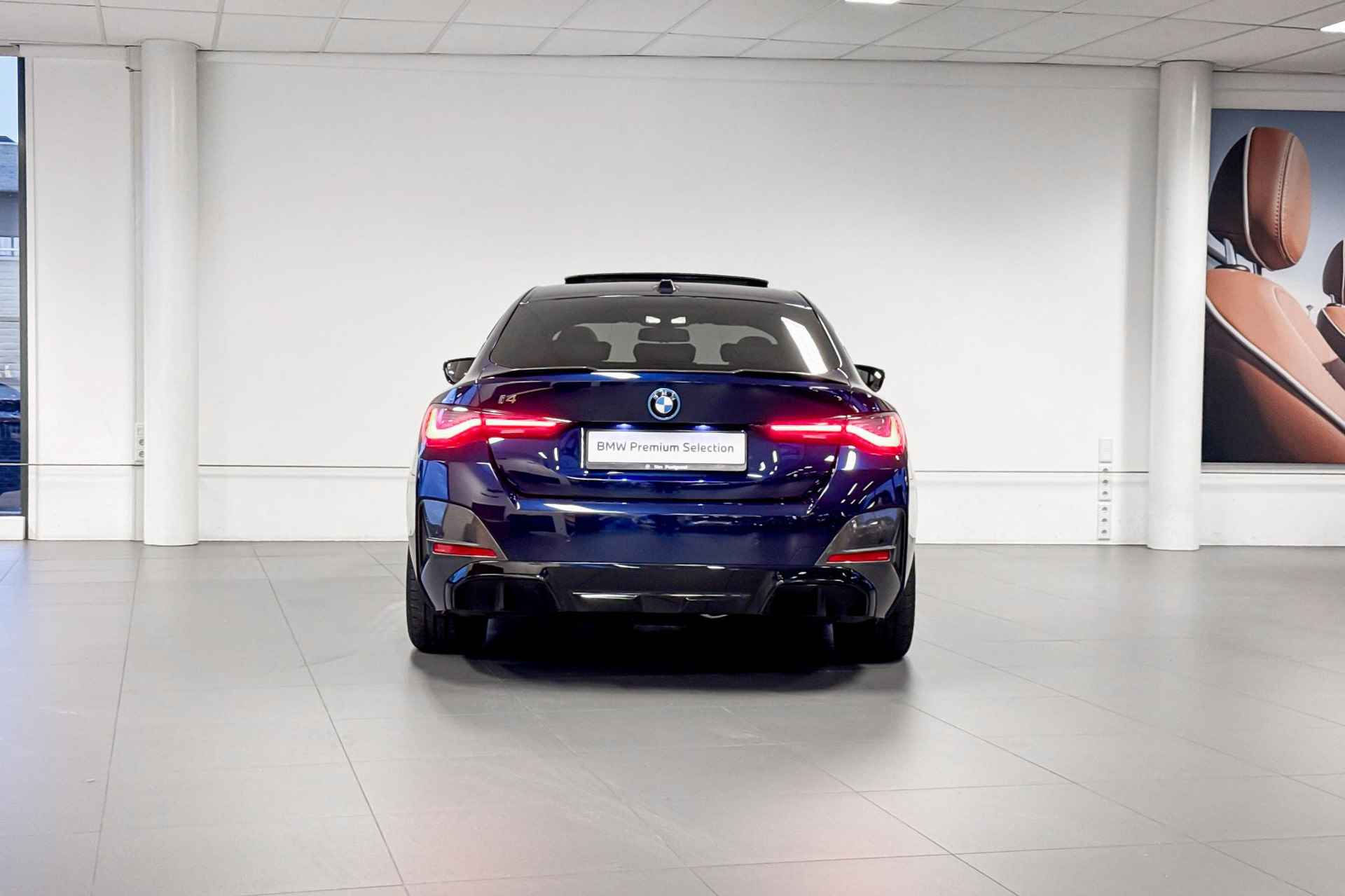 BMW i4 M50 High Executive 84 kWh | M Sport | Glazen Panoramadak | Harman Kardon | Comfort Access | Trekhaak | - 7/28