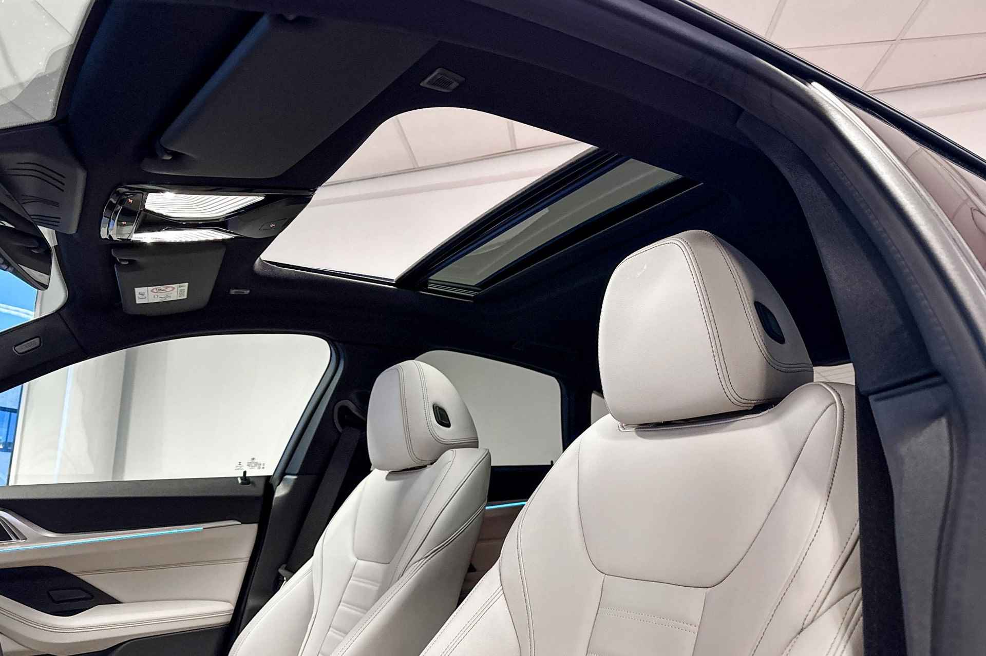 BMW i4 M50 High Executive 84 kWh | M Sport | Glazen Panoramadak | Harman Kardon | Comfort Access | Trekhaak | - 11/28