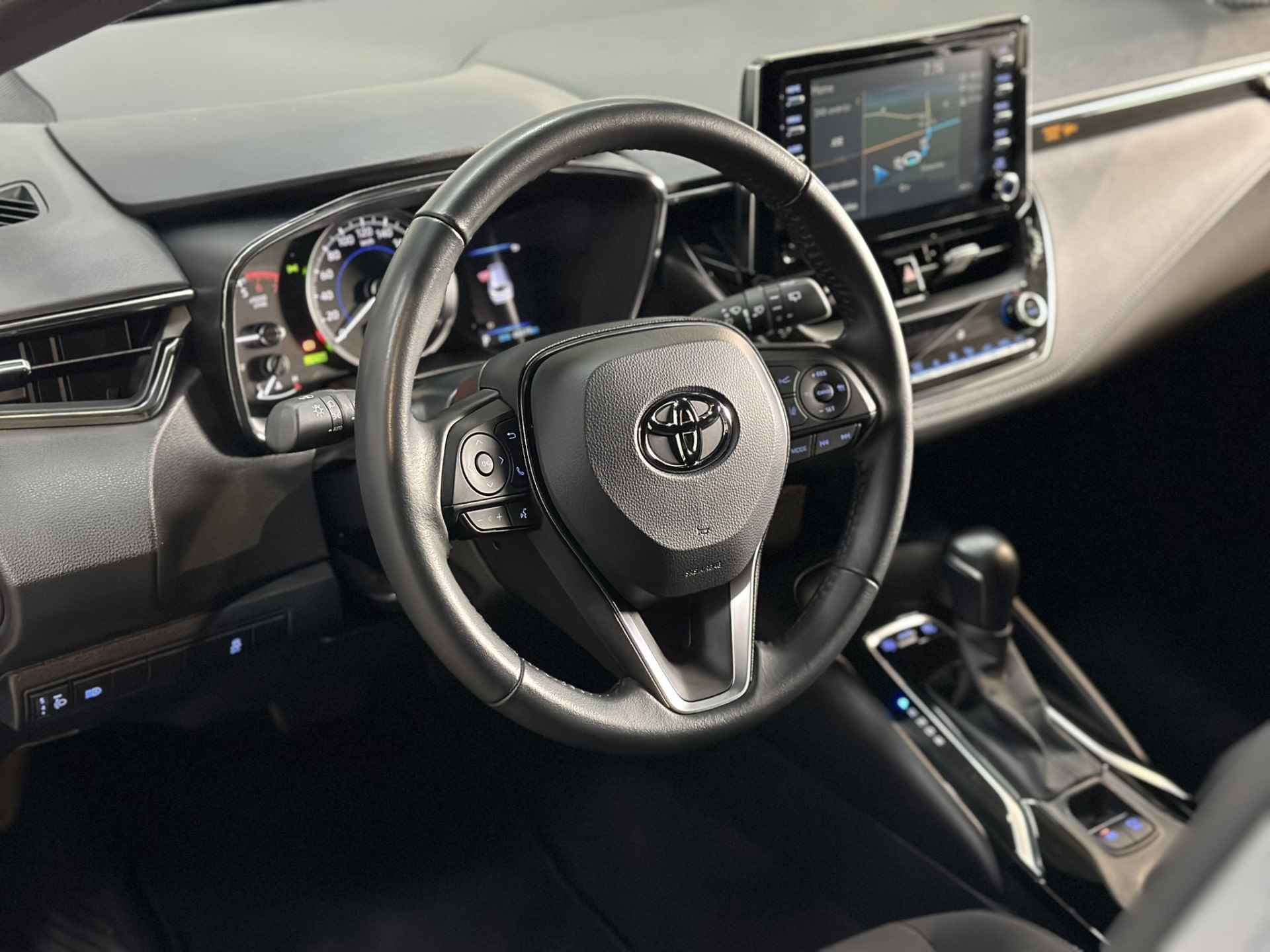 Toyota Corolla Touring Sports 1.8 Hybrid Active LED | Camera | Adaptive cruise | Navigatie | Apple Carplay Android Auto | Isofix | NAP | - 15/36